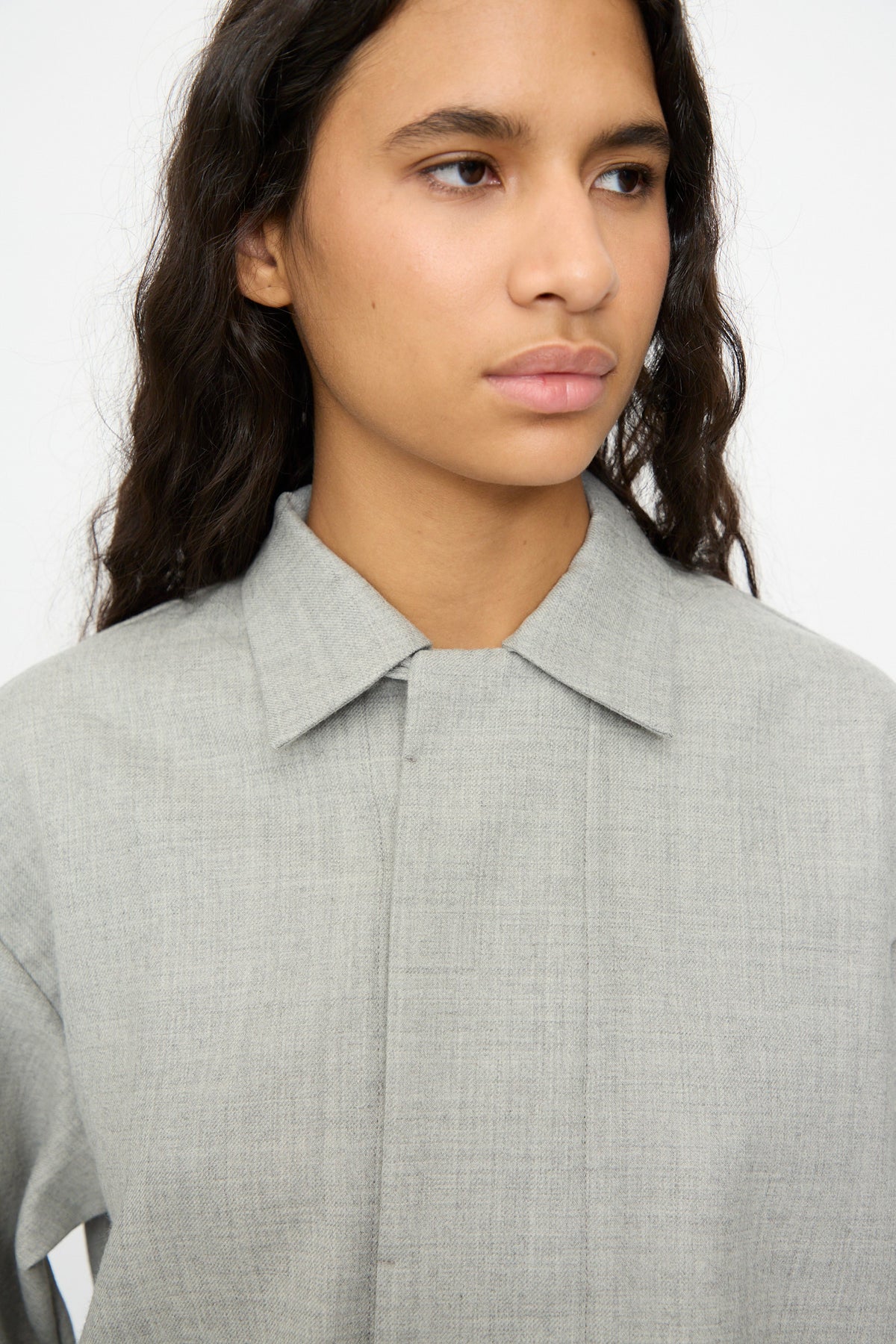 Person wearing a gray Nostalgic Artist’s Camp Collar Shirt.