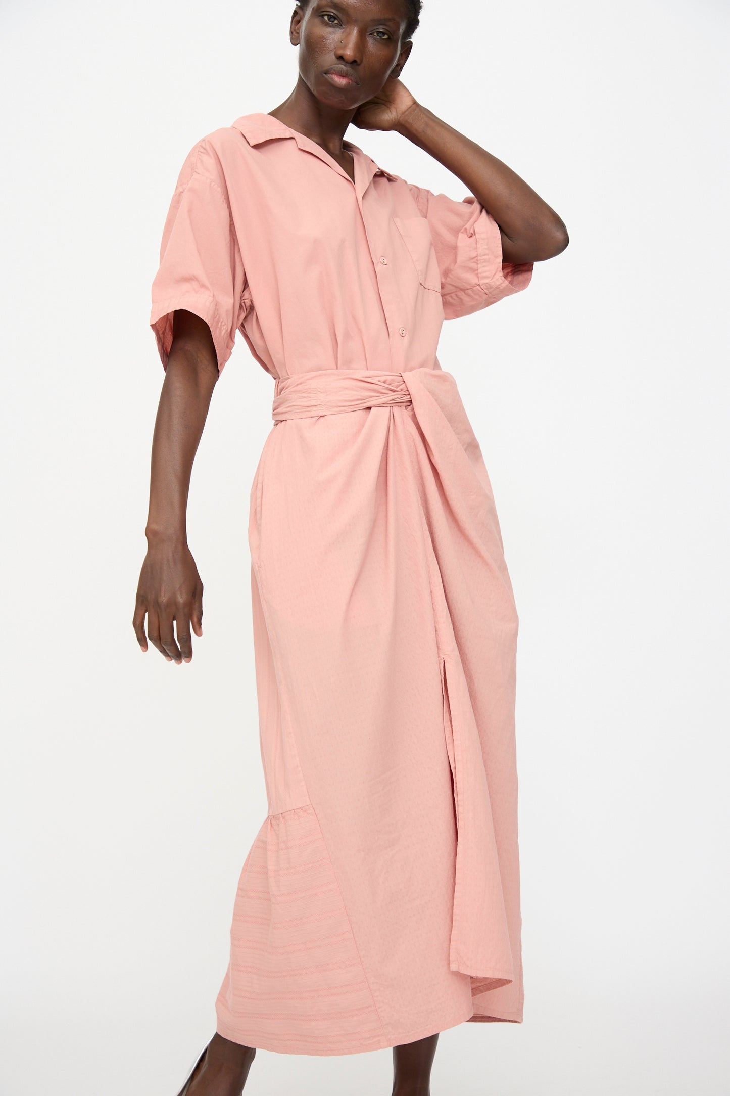 A person wearing the Cosmic Wonder Stripe Combination Wrapped Skirt in Rose Crystal stands against a plain white background.