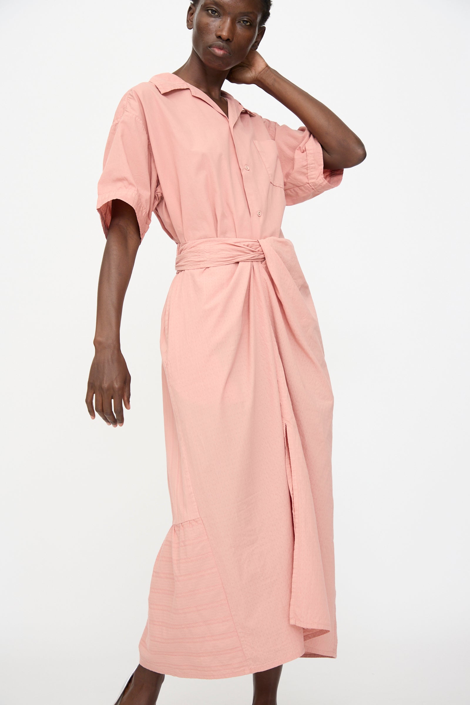 A person wearing the Cosmic Wonder Stripe Combination Wrapped Skirt in Rose Crystal stands against a plain white background.