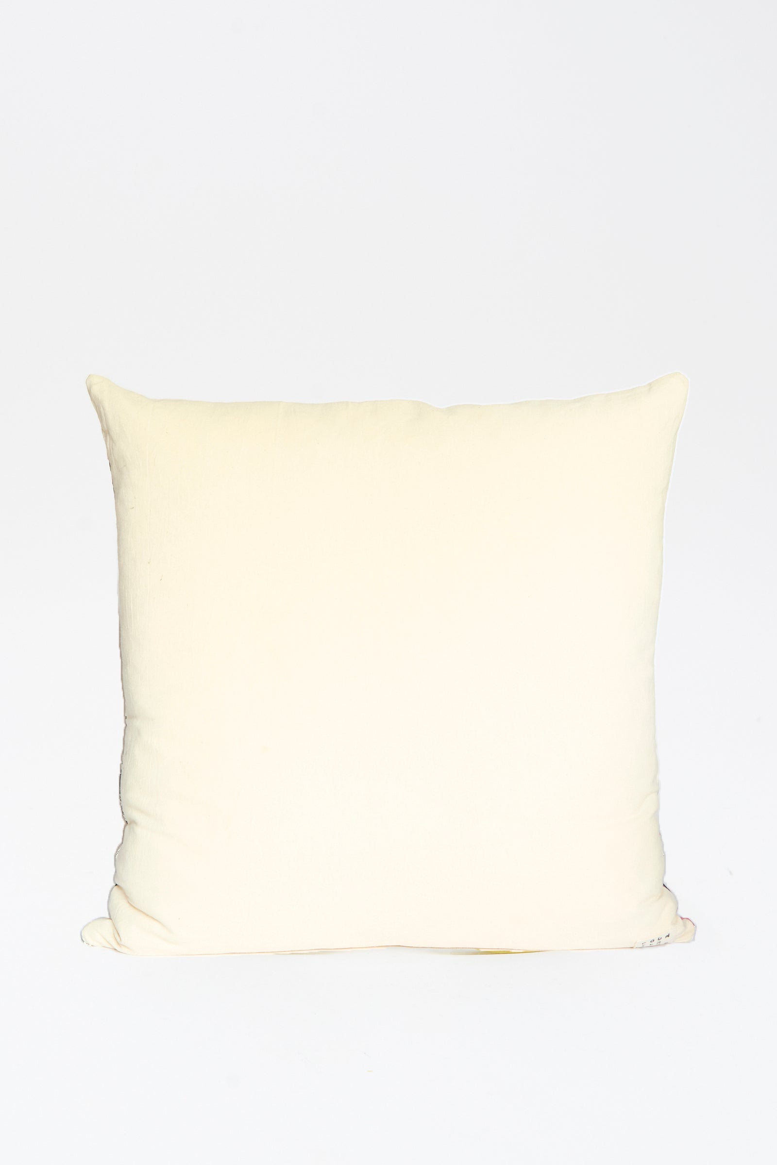 The Counterpane Patchwork Pillow (28" x 28") in Pink and Multi II is shown against a white background.