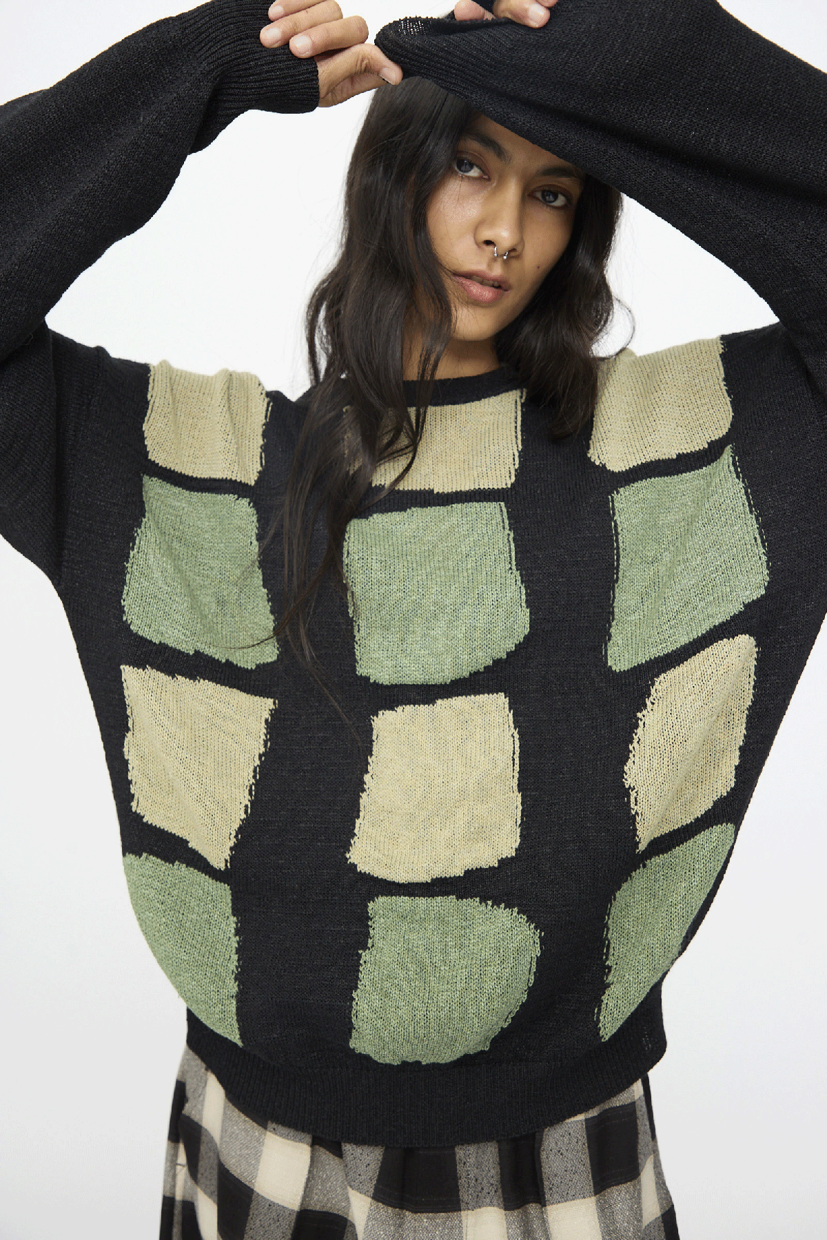 A gif of a woman wearing different styles from Cristaseya's PS26 collection.