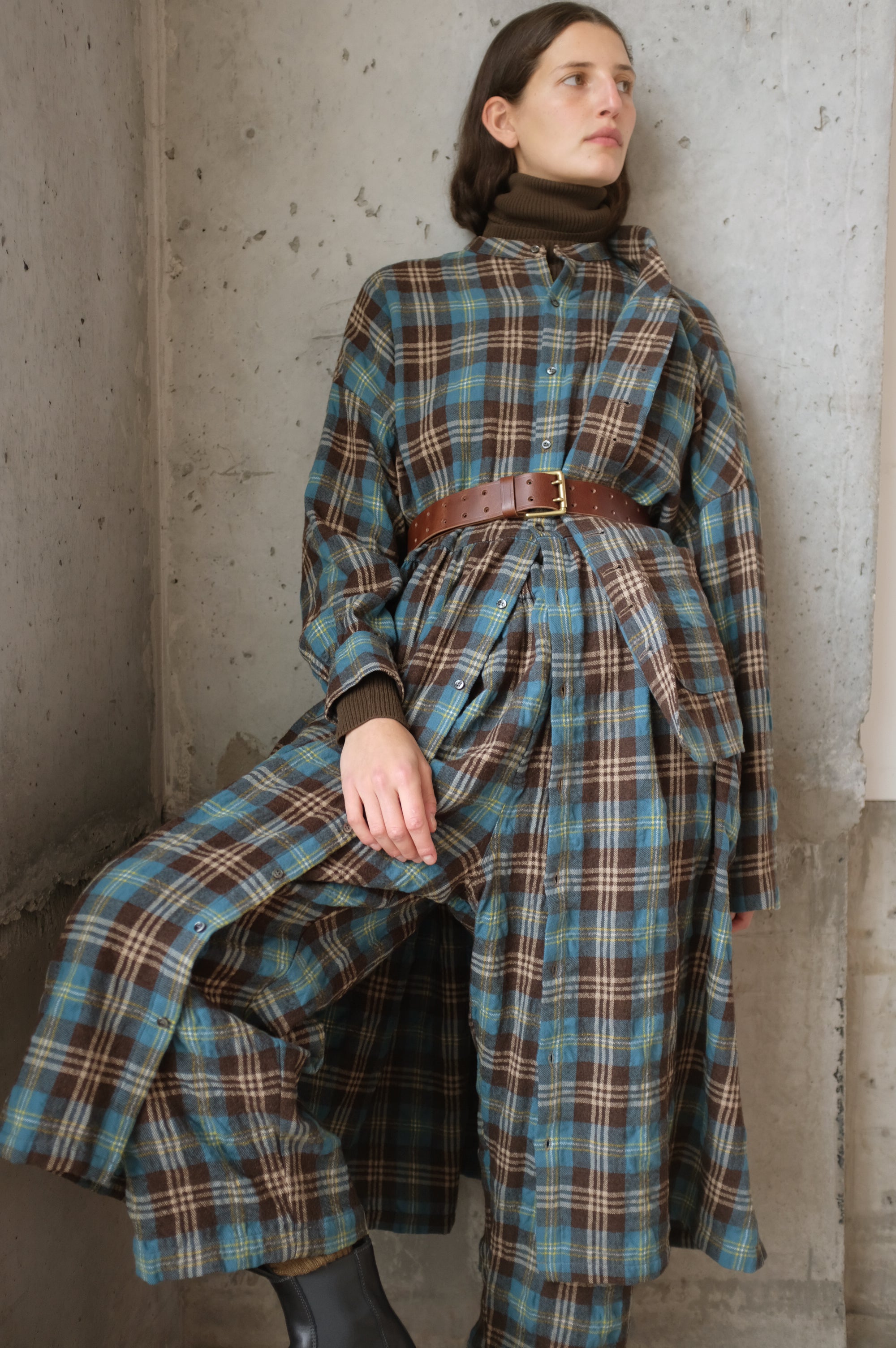 A model wearing the Wool and Cotton Washer Tartan Dress in Blue by Ichi Antiquités - Oroboro NYC