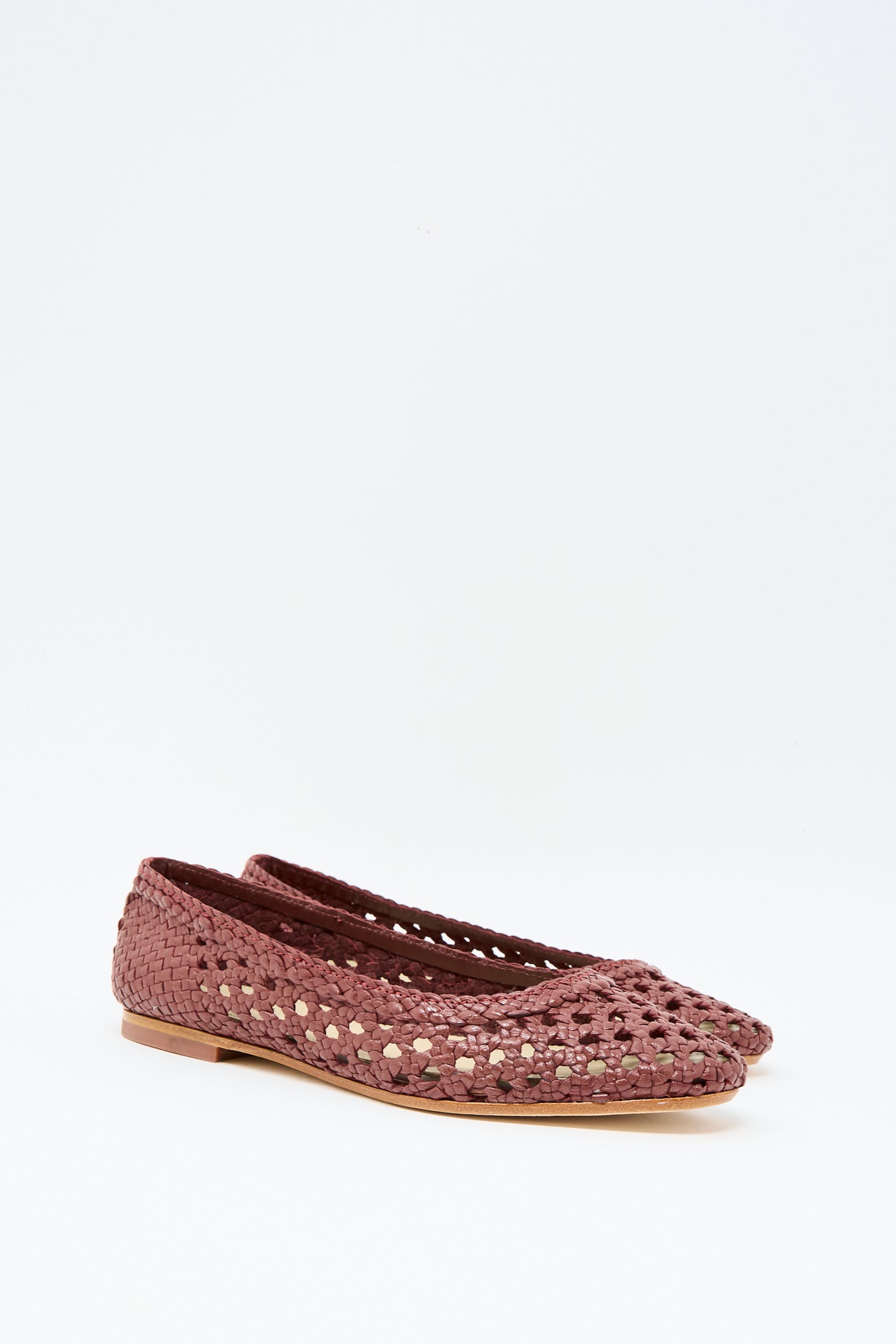Capri Ballerina in Bordo by Dragon Diffusion: woven leather flats in deep red with closed round toes and low wooden heels, shown against a plain white background.