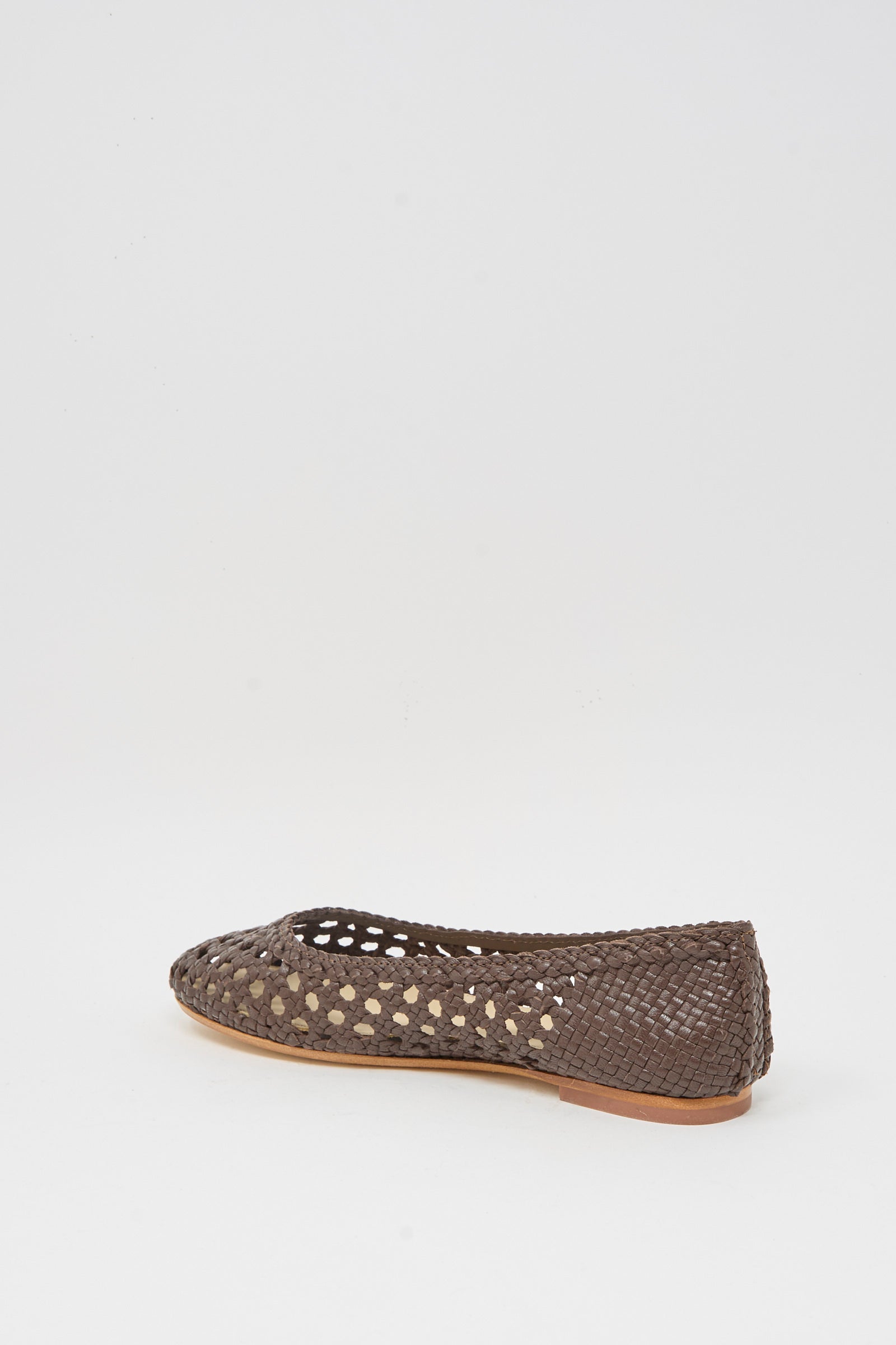 The Capri Ballerina in Dark Brown by Dragon Diffusion is a closed-toe woven goat leather flat with cutout design, displayed on a plain white background.