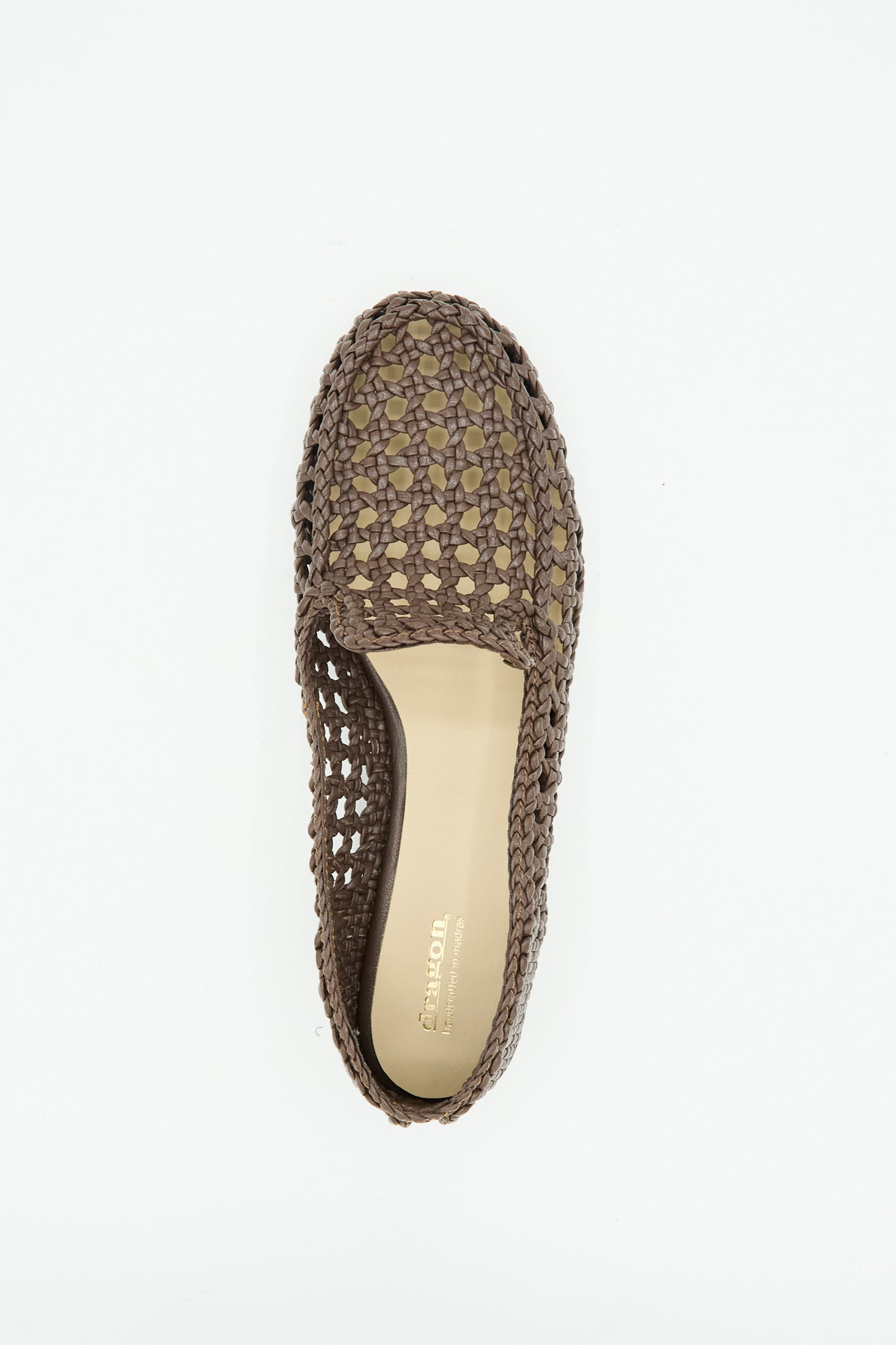 The Dragon Diffusion Dolly Moccasin in Dark Brown is a single woven leather slip-on with an almond toe, open sides, and a beige insole, shown from above on a white background.