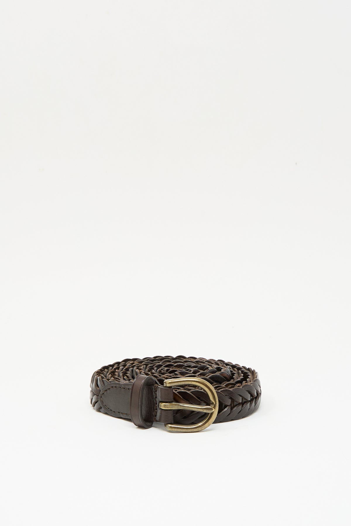 The Single Link Belt in Brown by Dragon Diffusion features a dark brown braided leather design with a gold-tone buckle, coiled on a plain white background.