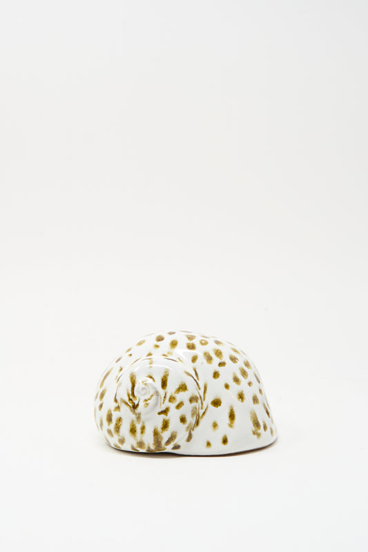 The Shell Rattle XCIV by E.C.C.E, a handmade ceramic piece with brown spots crafted in NYC, is displayed on a plain white background.