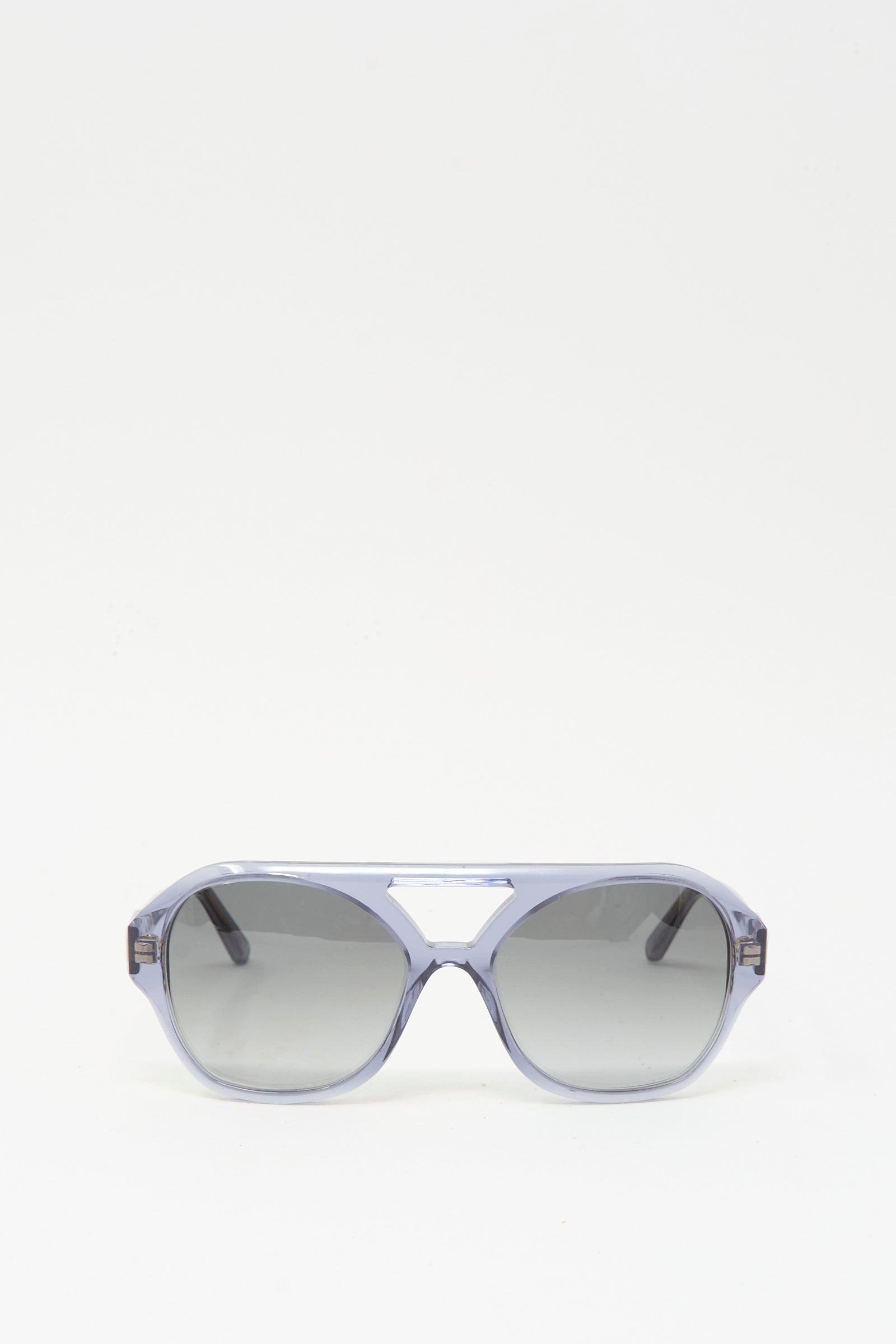 Chiyo Aviator Sunglasses in Waves by Eva Masaki feature gray lenses and translucent gray Italian acetate frames with UV protection, shown against a plain white background.