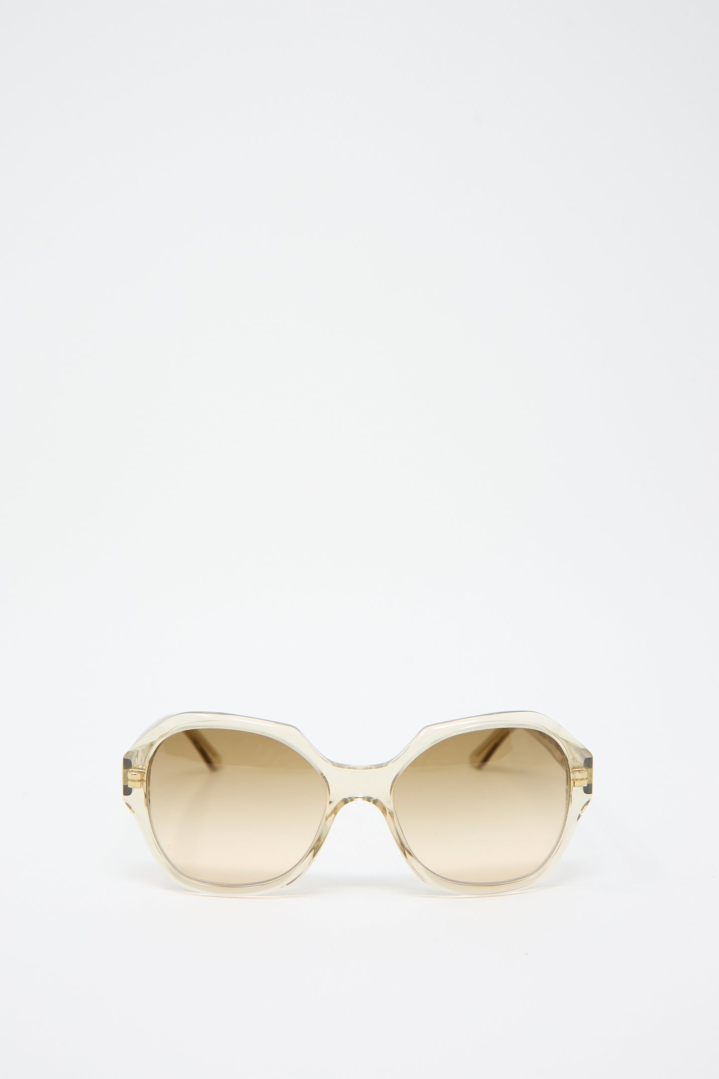 Eva Masaki 001 Sunglasses in Toast with beige-tinted Zeiss lenses on a plain white background.