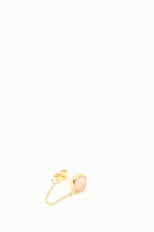 The Chain Stud Earring in Pink Shell by Grainne Morton boasts a vintage coral-inspired, shell-like design with an elegant gold chain, creating timeless sophistication against a white background.