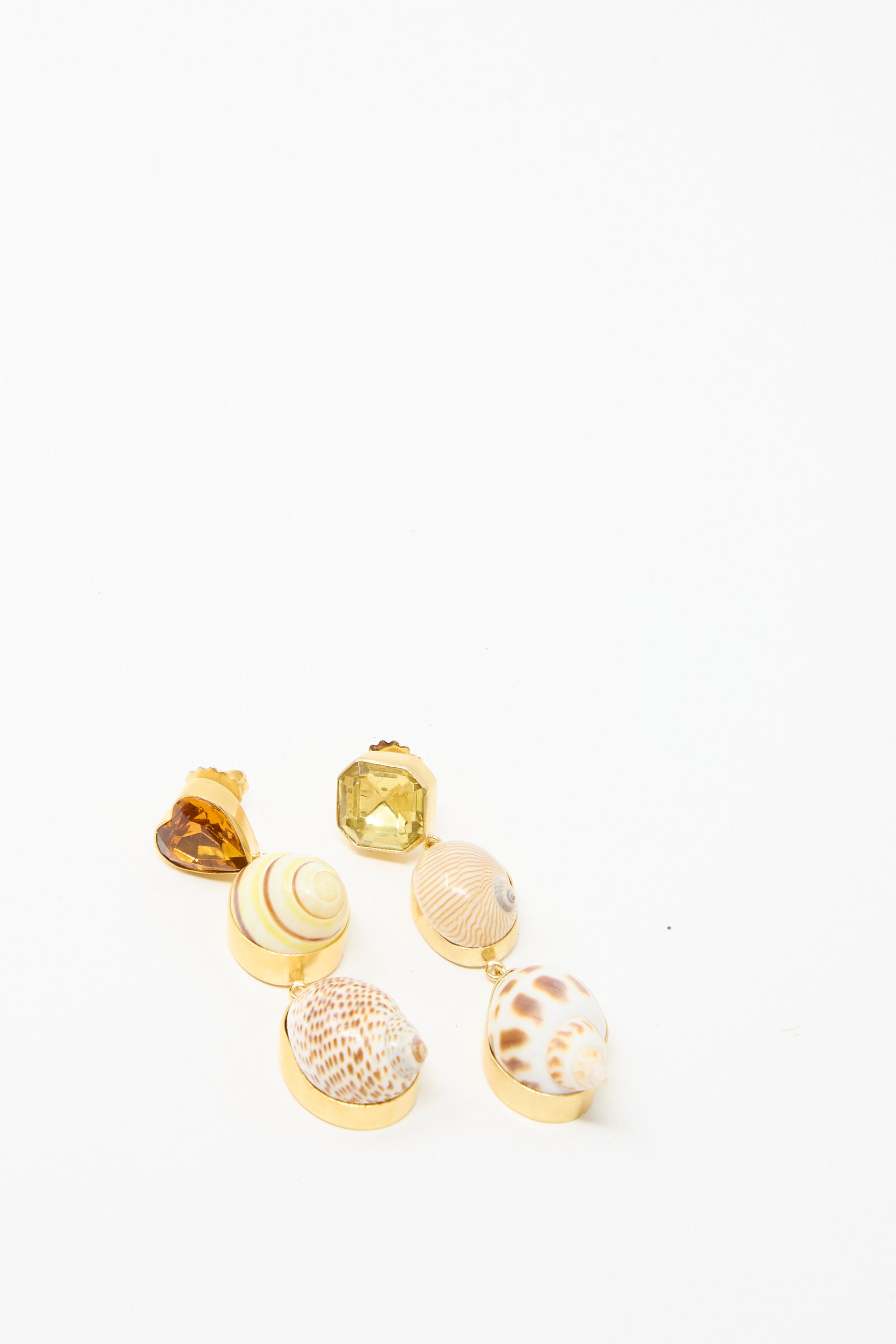 Shell Charm Drop Earrings by Grainne Morton feature seashells and colored gemstones set against a plain white background.