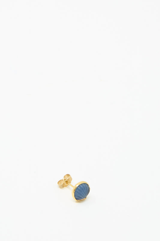 The Grainne Morton Stud Earring in Blue Shell showcases an 18k gold-plated design featuring a blue, textured oval stone on a pristine white backdrop.