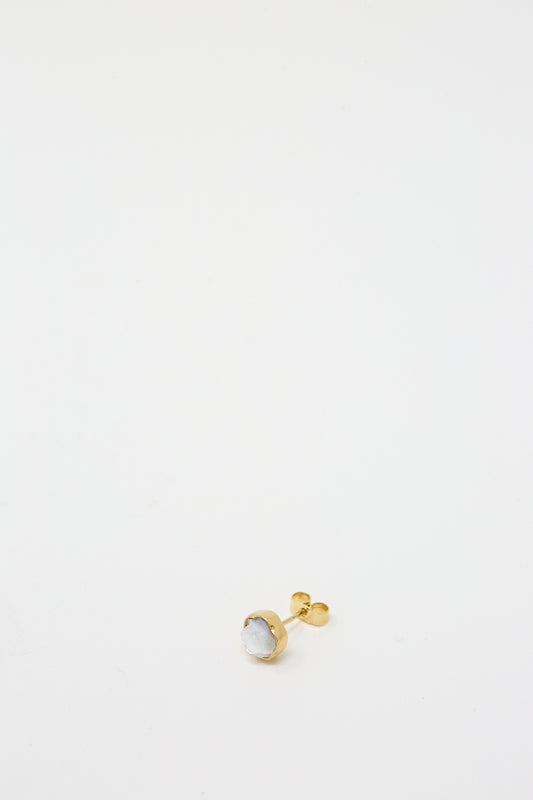 An 18K gold-plated silver Stud Earring in White Flower with a white stone by Grainne Morton.