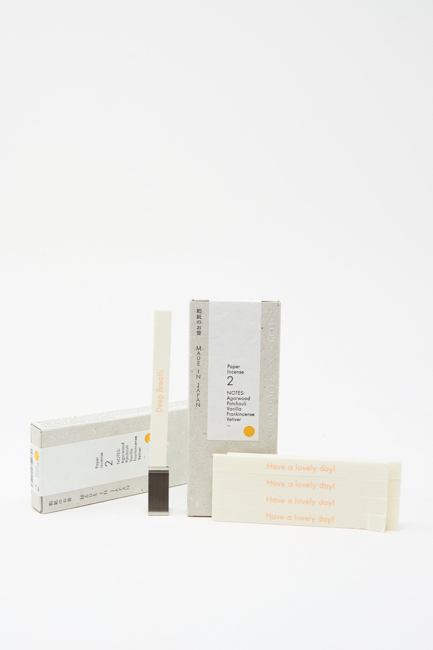 Morihata’s Washi Paper Incense Strips in Elegant Agarwood offer minimalist style; each strip features “Have a lovely day!” printed in yellow-orange text, blending functional stationery with delightful fragrance.