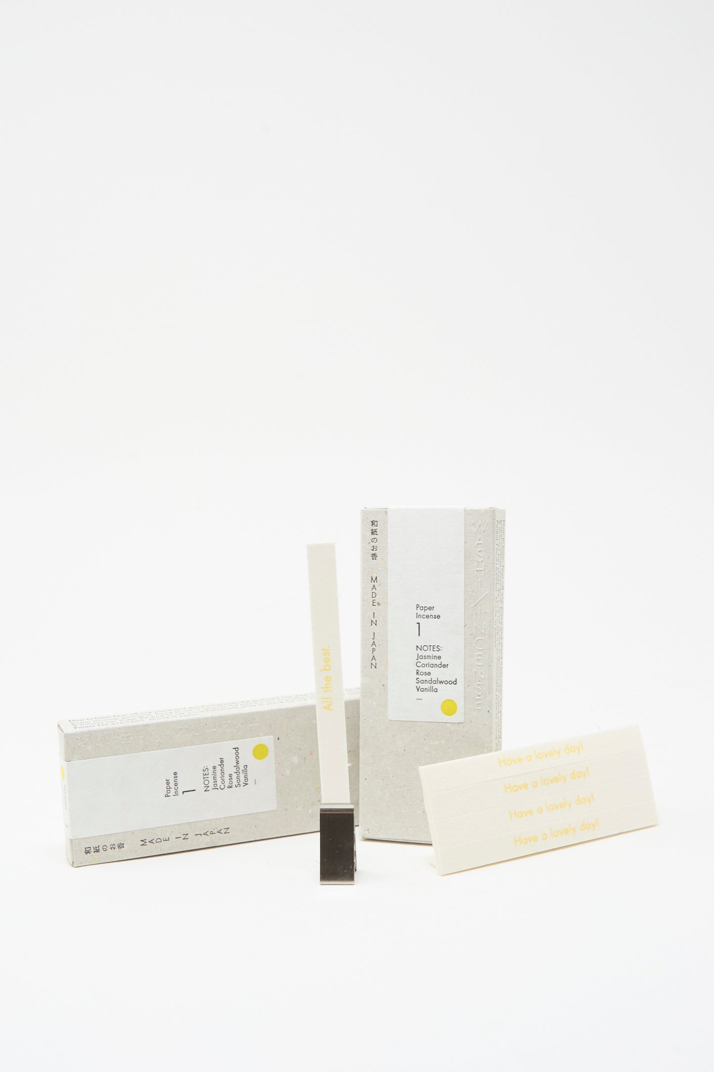 Morihata’s Washi Paper Incense Strips in Floral Warmth blend minimalist yellow and grey accents inspired by Awaji, Japan. Set in boxed packaging on a white background, their calm design echoes the natural aroma of washi paper incense.