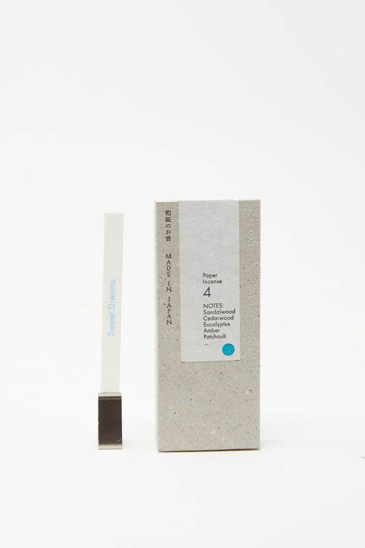 A box of Morihata Washi Paper Incense Strips in Mellow Grove, made in Japan, with one incense strip standing upright beside the box on a white background.