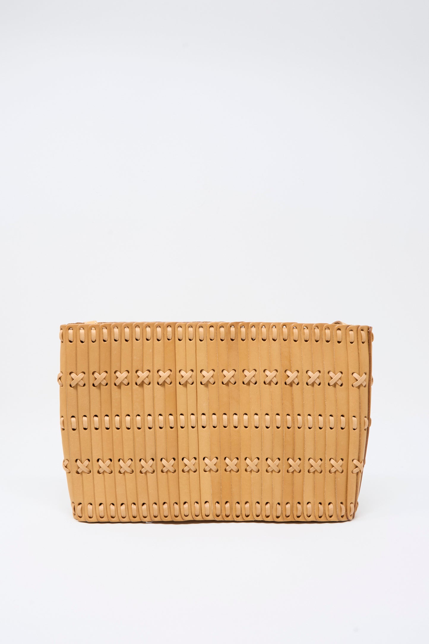 The Hatori Leather Shoulder 60 Bag in Natural with Tan Lacing is a rectangular clutch meticulously handcrafted from vegetable-tanned leather, featuring vertical slats and crisscross lacing details, showcased against a plain white background.