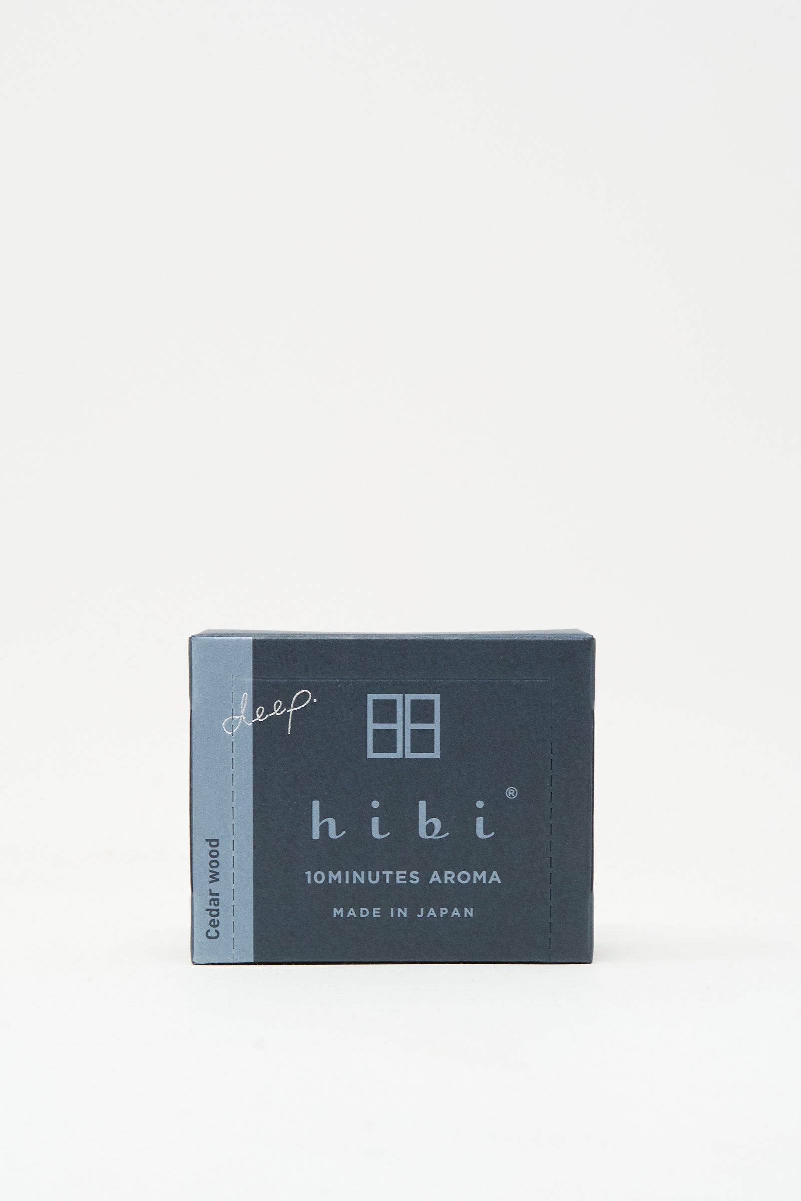 A small navy blue box labeled "Cedarwood Incense Matches" from Hibi, featuring Japanese incense matches with a cedar scent and "Made in Japan" below the product name.