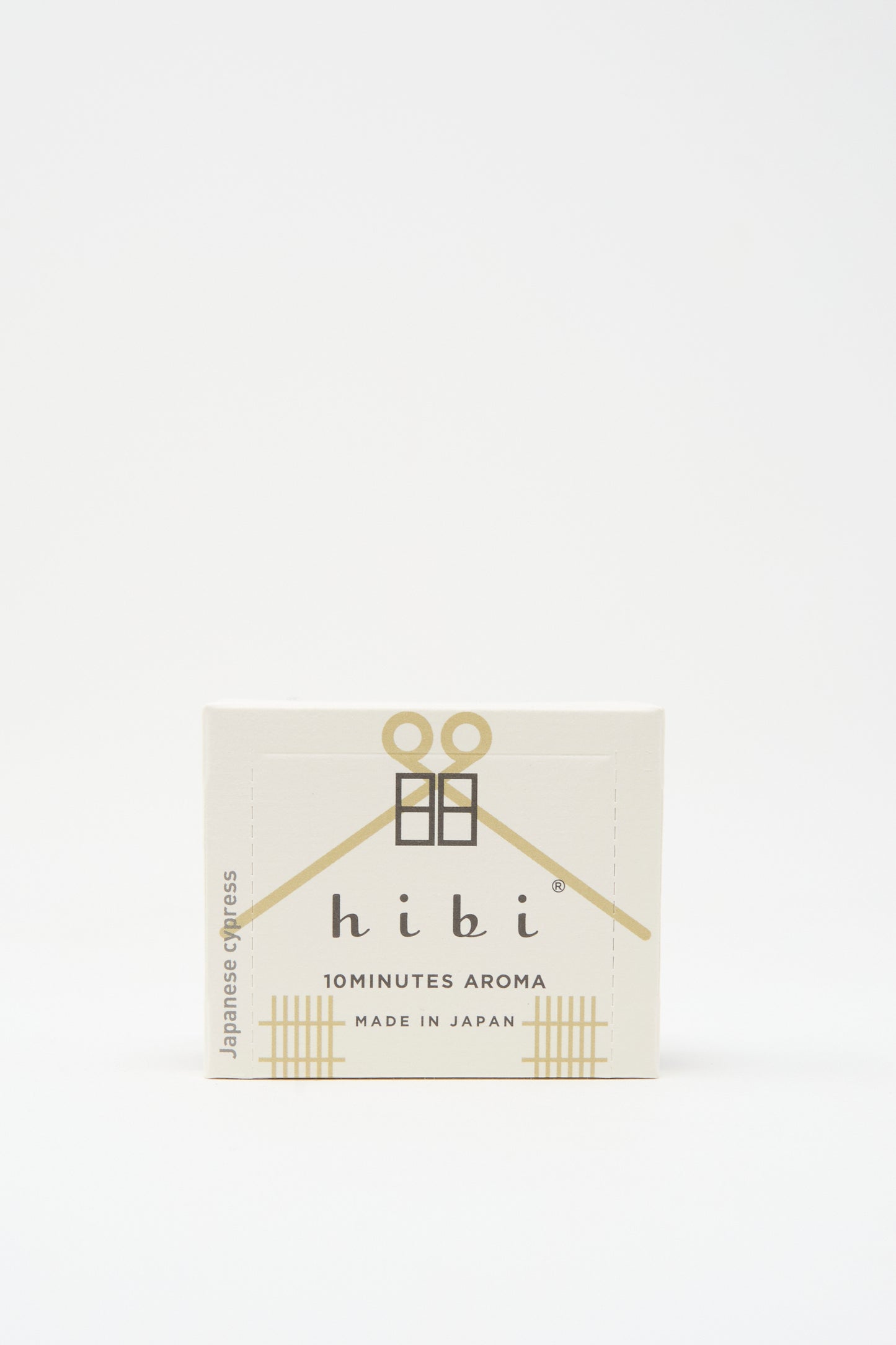 A minimalist white box labeled "hibi 10 MINUTES AROMA MADE IN JAPAN" features handcrafted Incense Matches by Hibi with gold graphics and Japanese cypress scent, inspired by traditional Japanese incense.