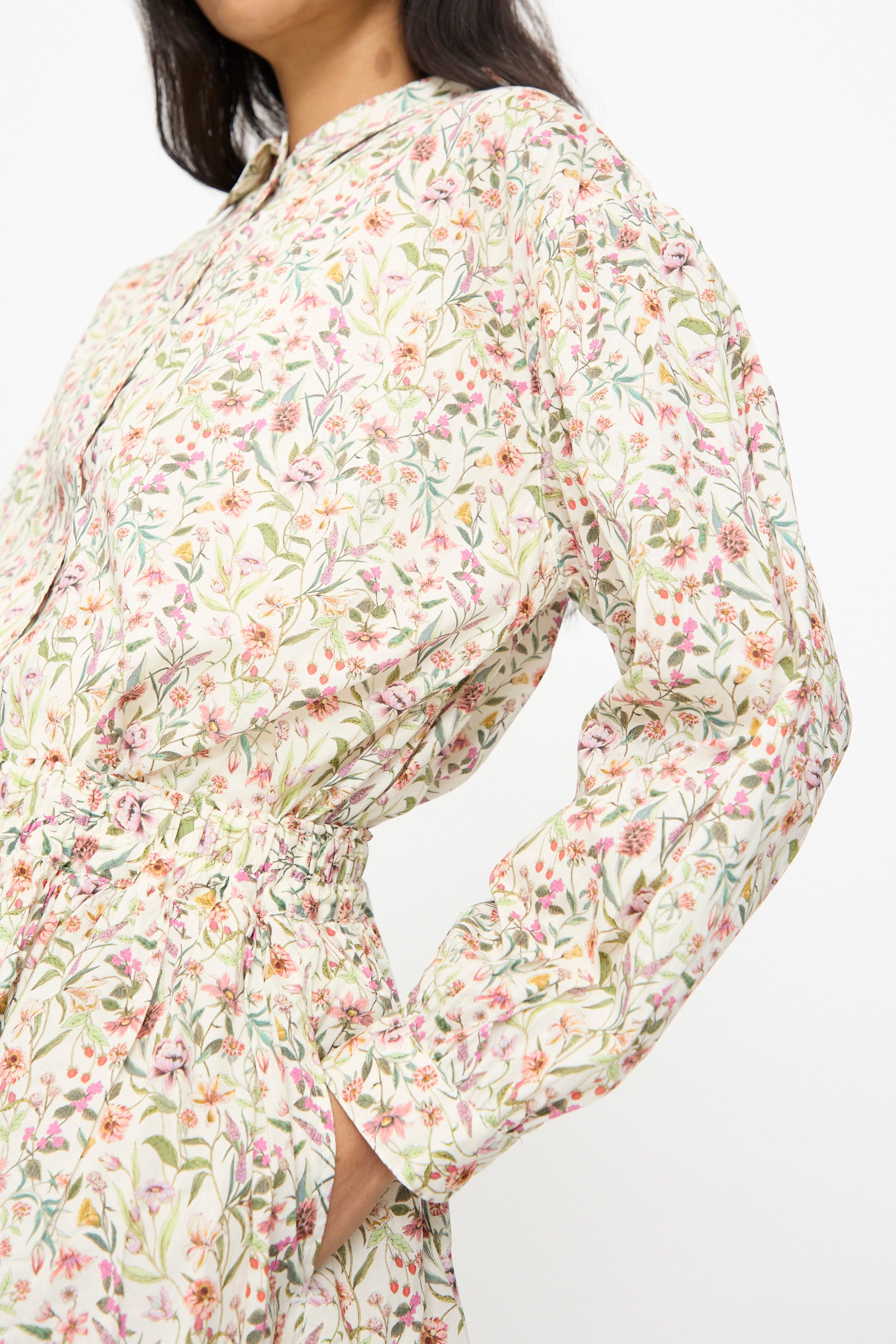 A model wears the Ichi Antiquités Cotton Liberty Skirt in Flower Print, an A-line floral skirt, shown from shoulders to waist against a plain background.