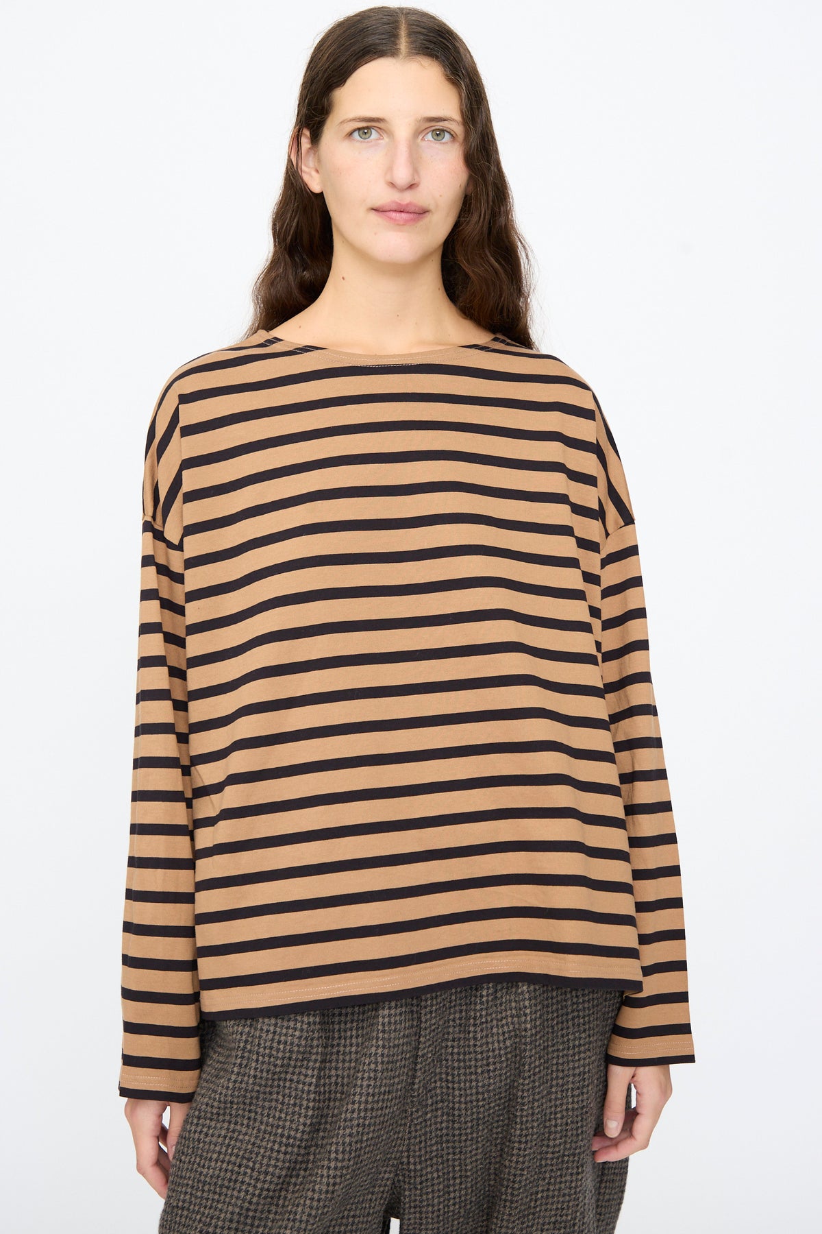 A person wearing an Ichi Antiquités Cotton Stripe Pullover in mocha and navy, featuring a boat neckline.
