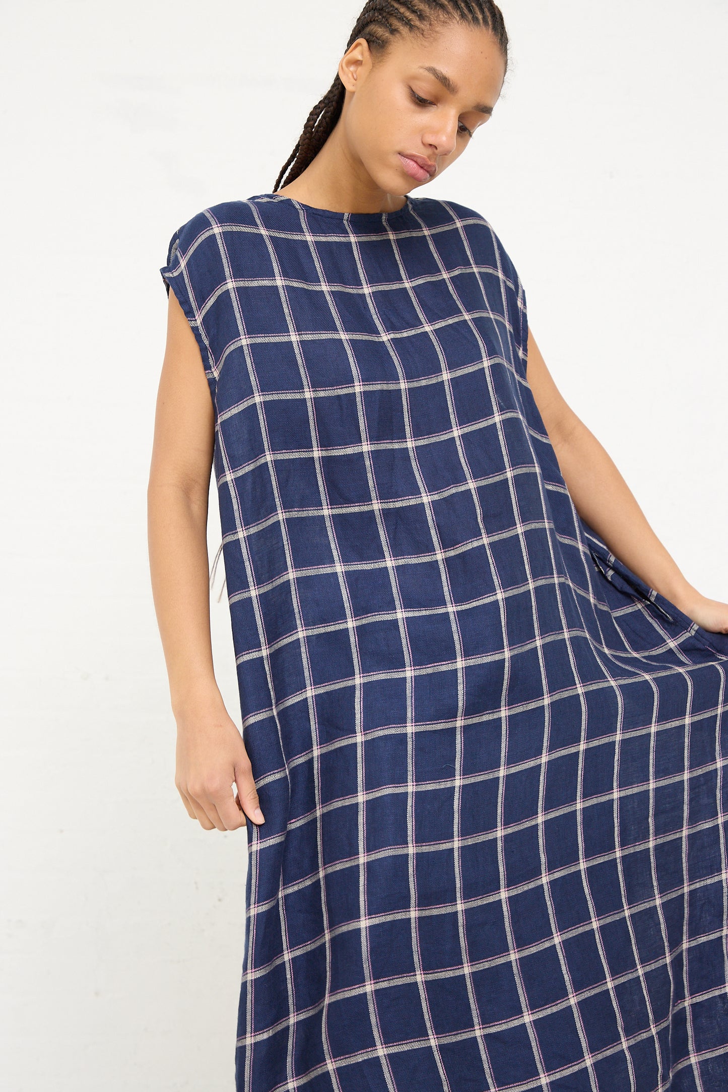 Woman posing in an Ichi Antiquités Linen Check Dress in Navy against a white background.