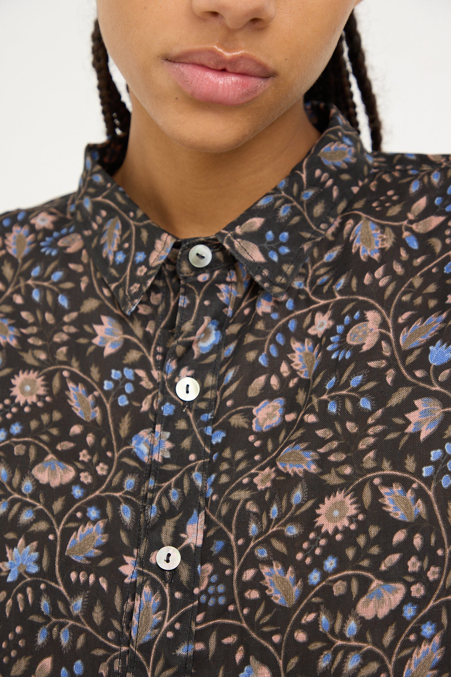 Close-up of a woman wearing an Ichi Antiquités Linen Floral Shirt in Black.