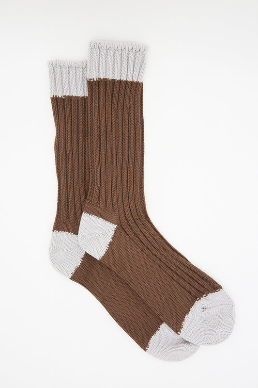A pair of brown and white Ichi Antiquités Organic Cotton Rib Socks with ribbed texture on a white background.