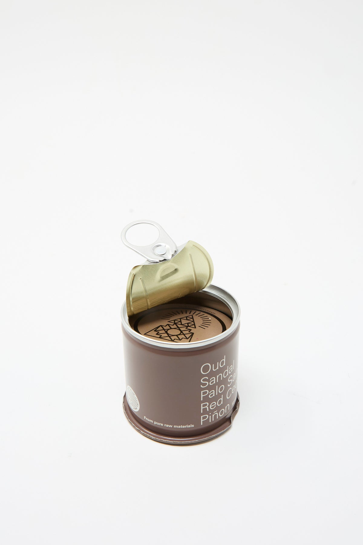 An open metal can of Incausa Discovery Incense Cones containing Oud and Makko cones, with labels listing scent varieties on the side.