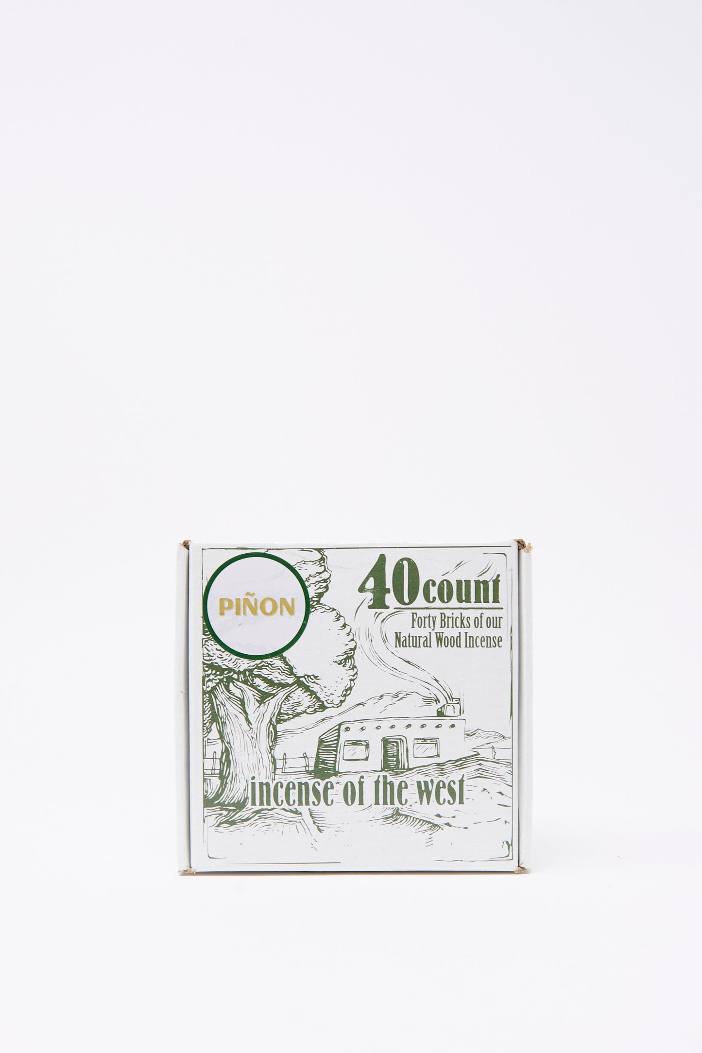 The Piñon Incense Box by Incense of the West contains 40 sticks, packaged with a tree and trailer design—ideal for use in incense burners or traditional New Mexican clay holders.