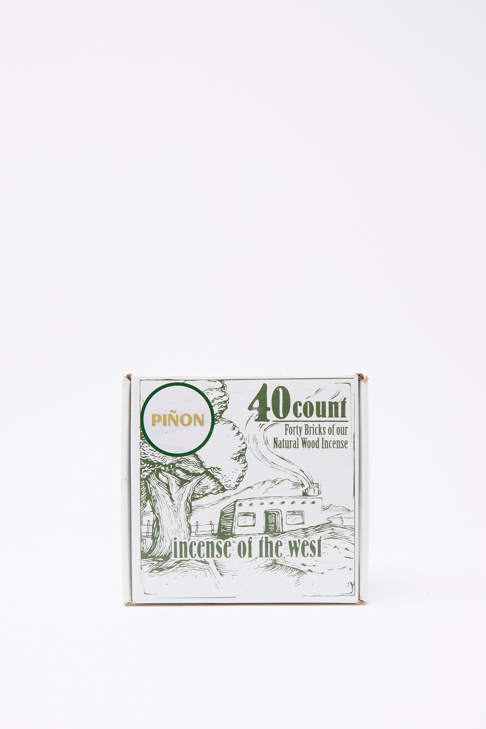 The Piñon Incense Box by Incense of the West contains 40 sticks, packaged with a tree and trailer design—ideal for use in incense burners or traditional New Mexican clay holders.