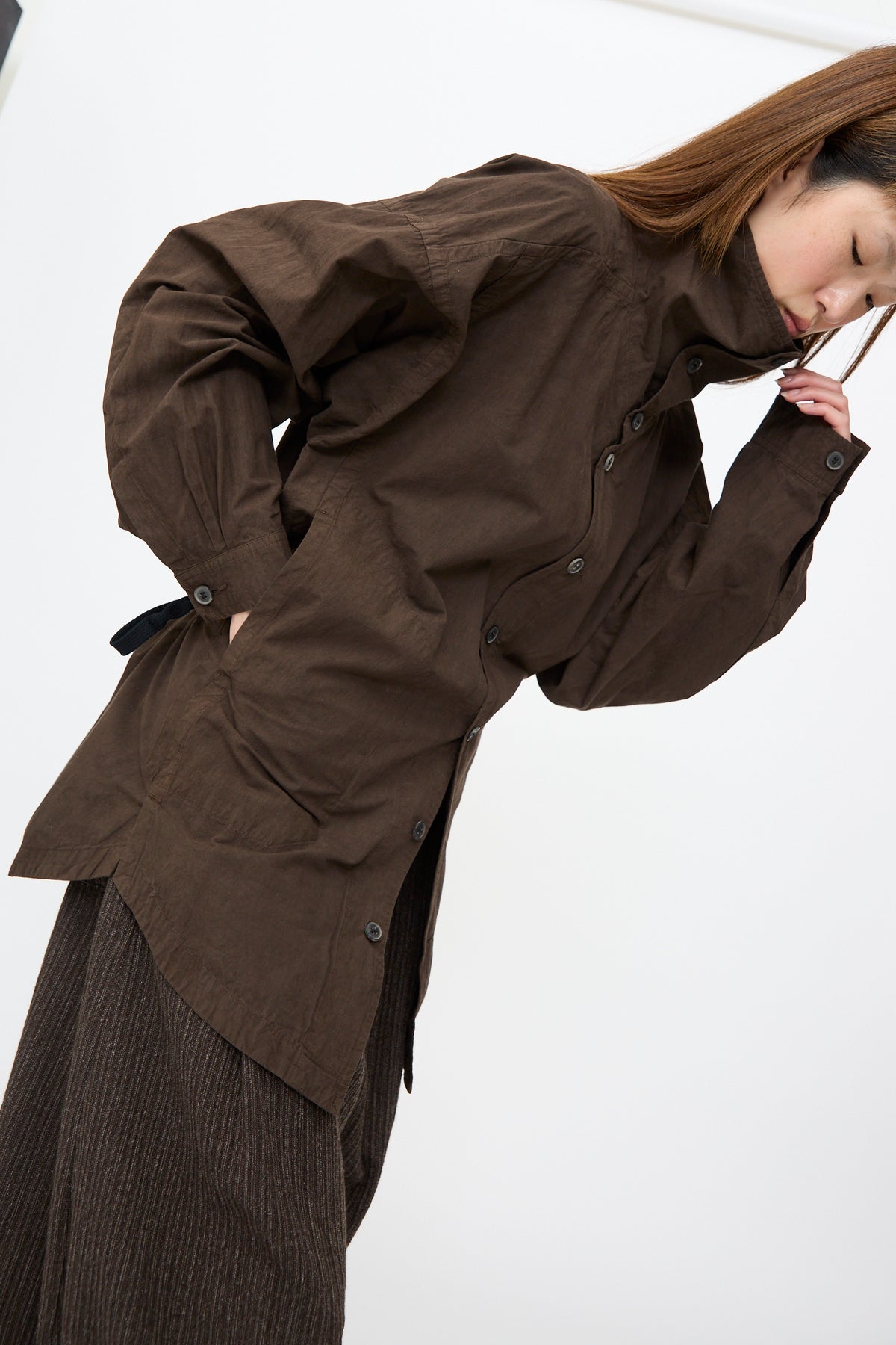 Jan-Jan Van Essche Cotton Wool Shirt #110 in Doro Zome, an oversized dark brown Japanese-made shirt jacket with a button-down design, high collar, and side pockets.
