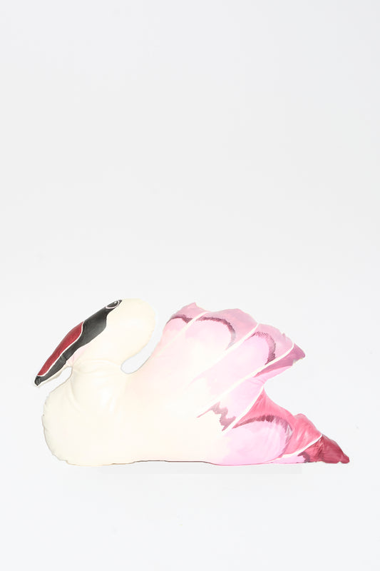 The Hand Painted Swan Pillow I by Jess Feury features a white body, pink wings, and a black and red beak. This handmade pillow is shown against a plain white background.