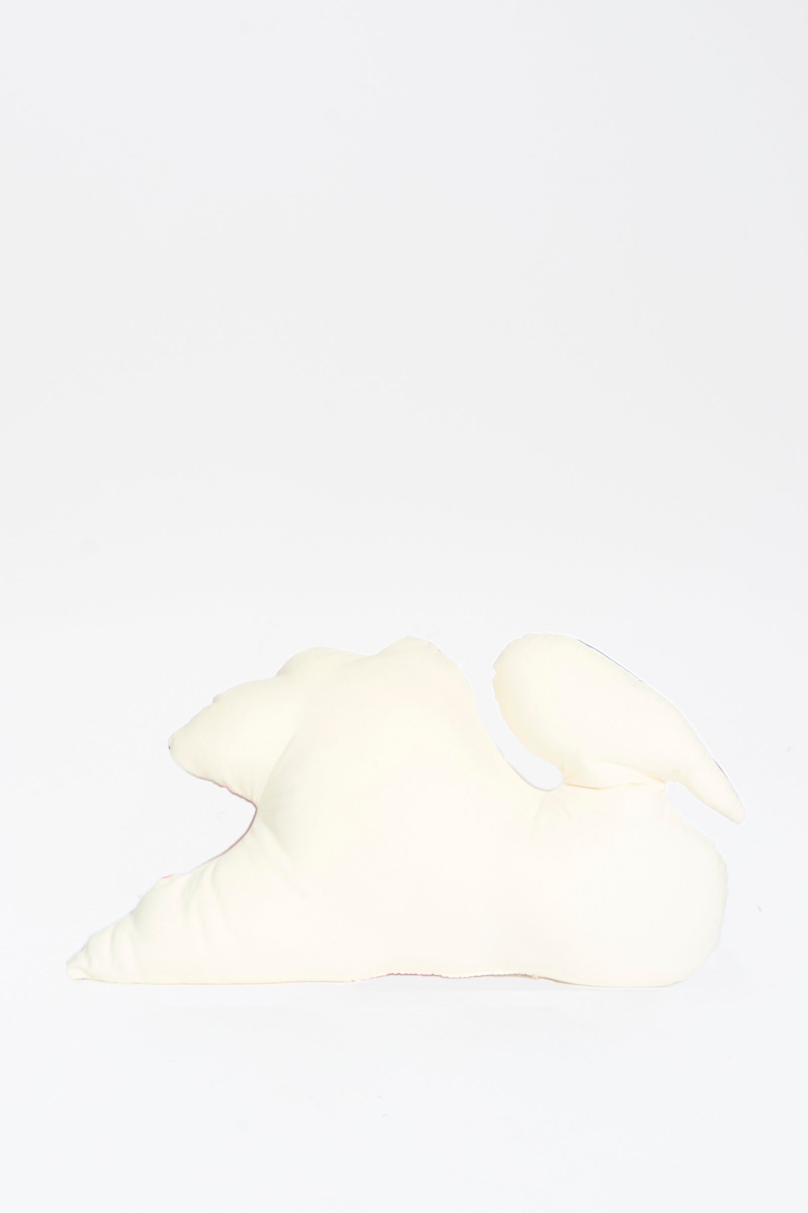 The Hand Painted Swan Pillow I by Jess Feury, featuring a soft abstract swan shape, is displayed on a plain white background.