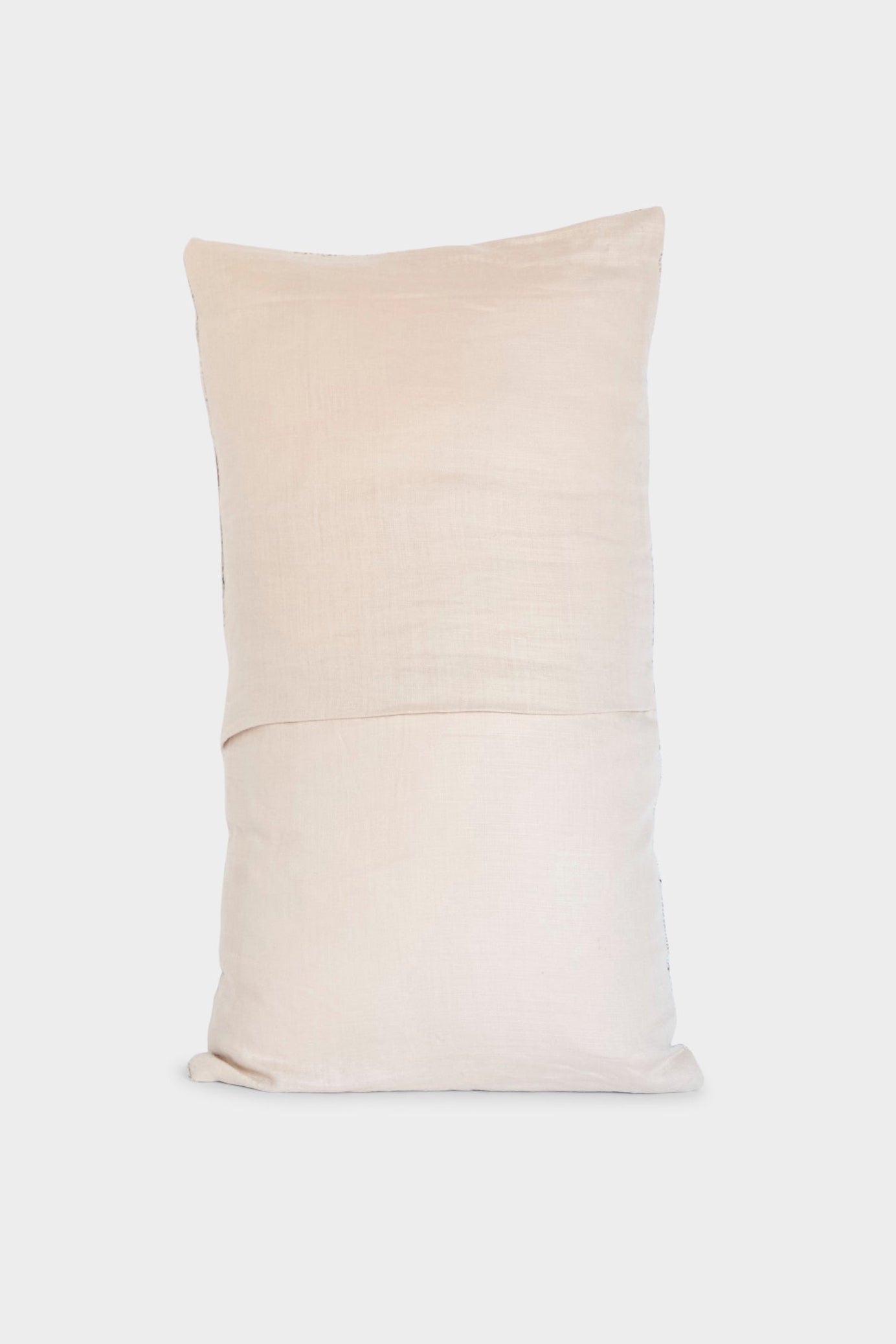 The Jess Feury Handmade Rock Slab Pillow in Neutral Tones stands upright against a white background, featuring sustainable fibers and timeless style.