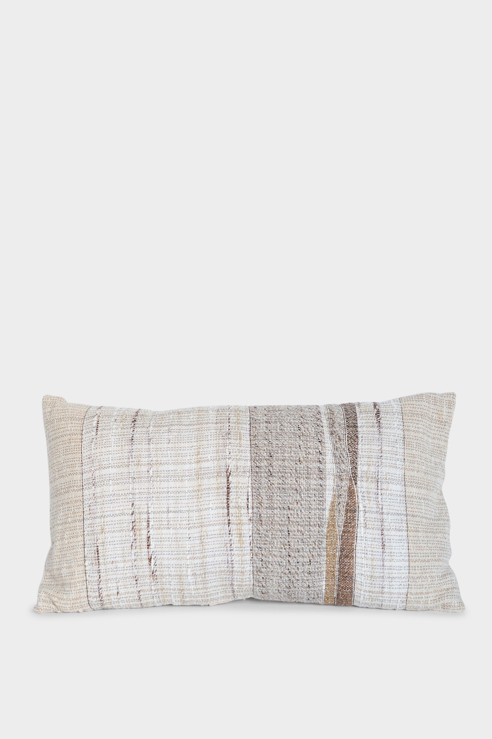 The Jess Feury Handmade Rock Slab Pillow in Neutral Tones is crafted in California with sustainable fibers, showcasing a woven texture and striped patterns in beige, cream, and light brown on a white background.