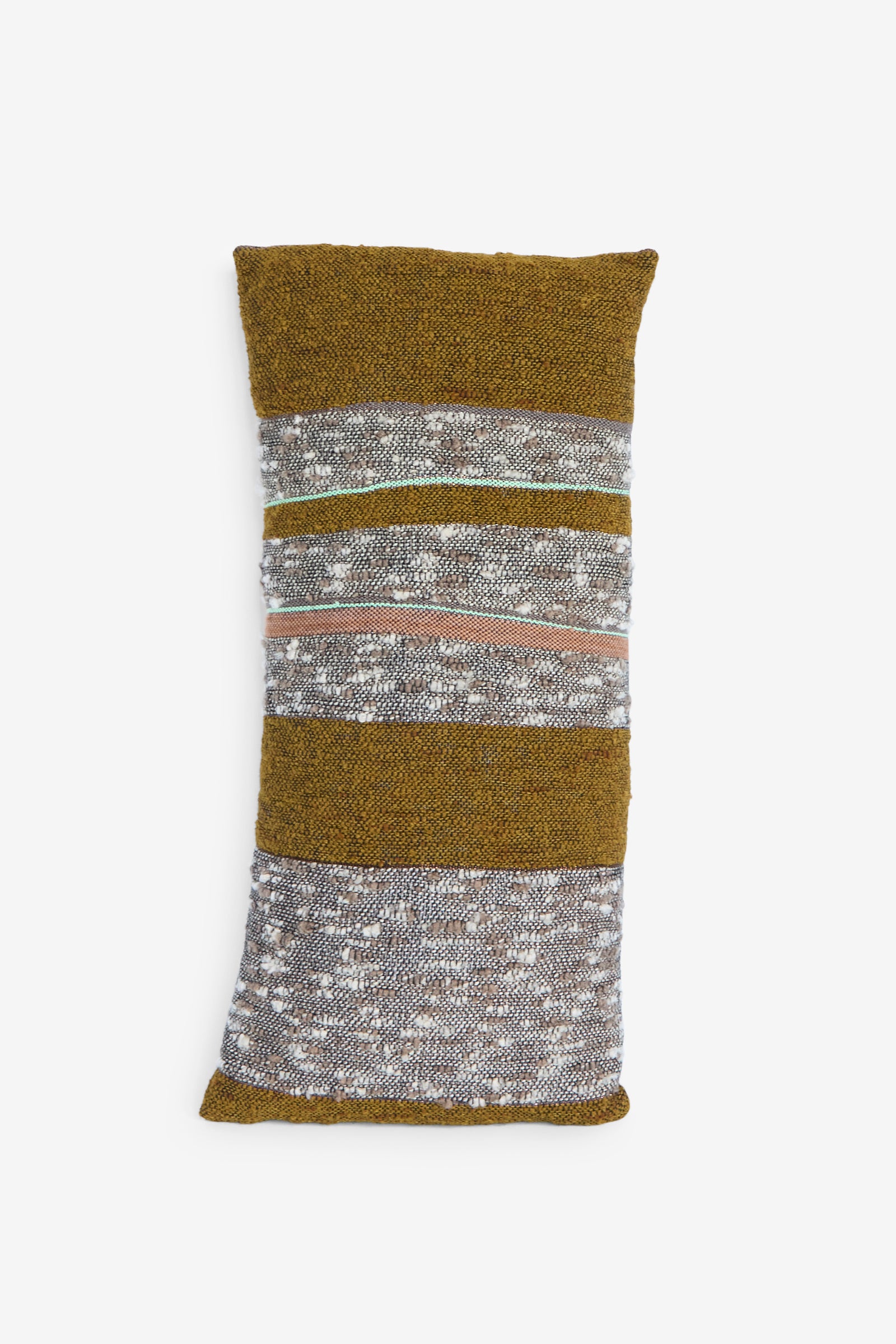 The Handwoven Boucle Slab Pillow in Olive & Earth by Jess Feury is a rectangular cushion, handmade in California, featuring horizontal stripes in mustard yellow, gray, and speckled patterns on a white background.