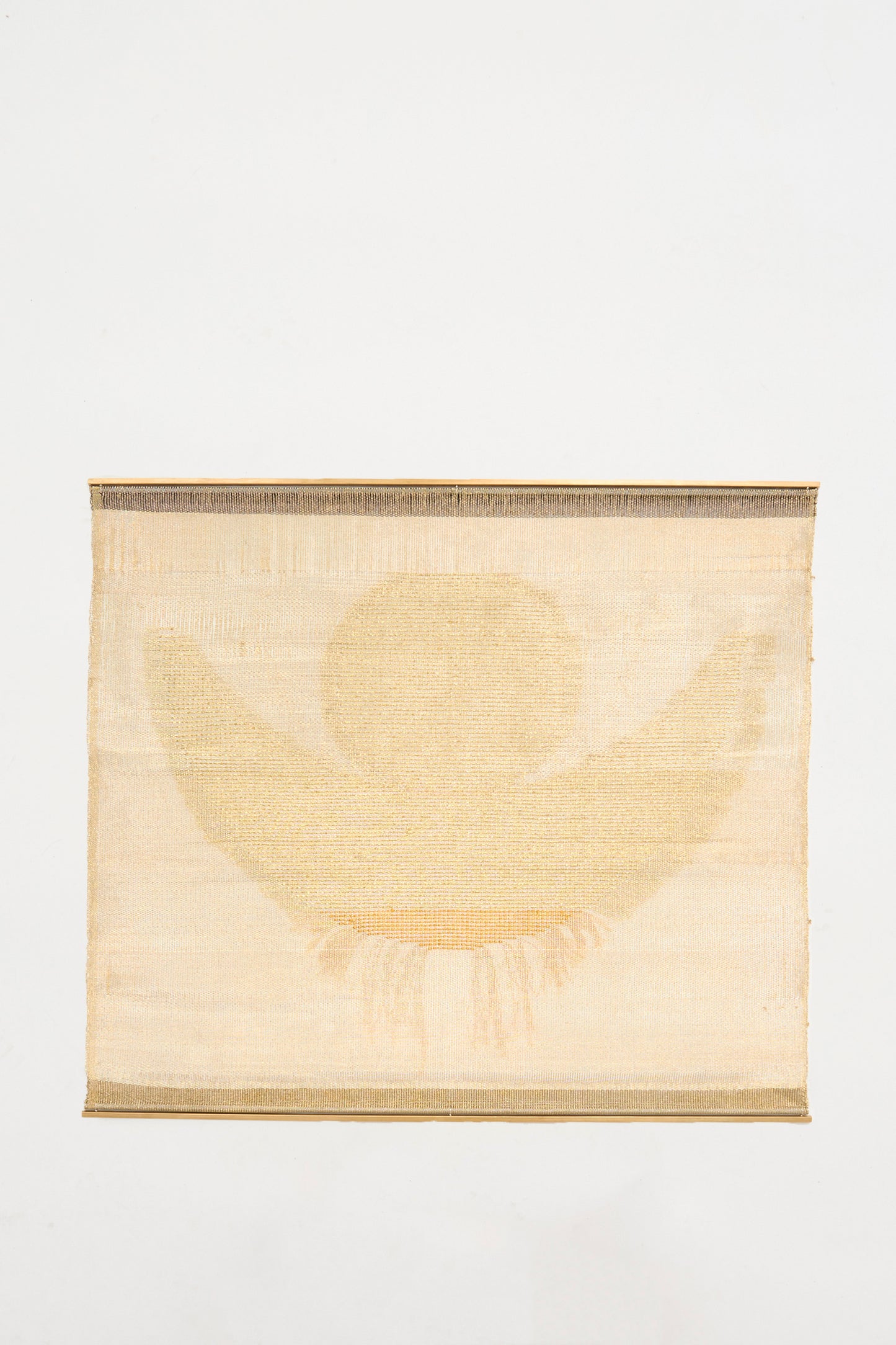 The Hermes Crescent Moon Weaving by Justine Ashbee is a rectangular wall hanging with subtle abstract sun and wing forms in beige on white, handmade in the UK.
