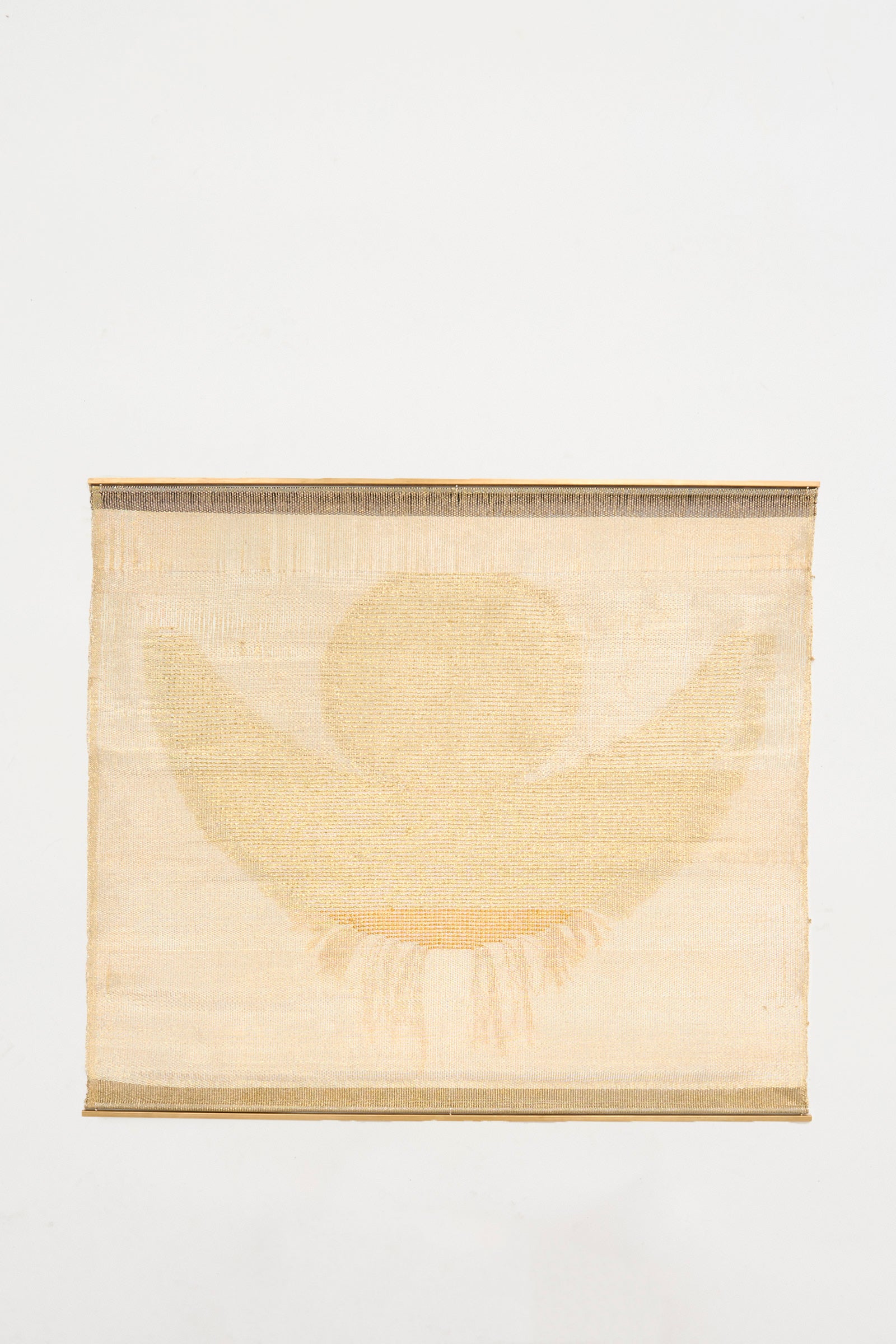 The Hermes Crescent Moon Weaving by Justine Ashbee is a rectangular wall hanging with subtle abstract sun and wing forms in beige on white, handmade in the UK.