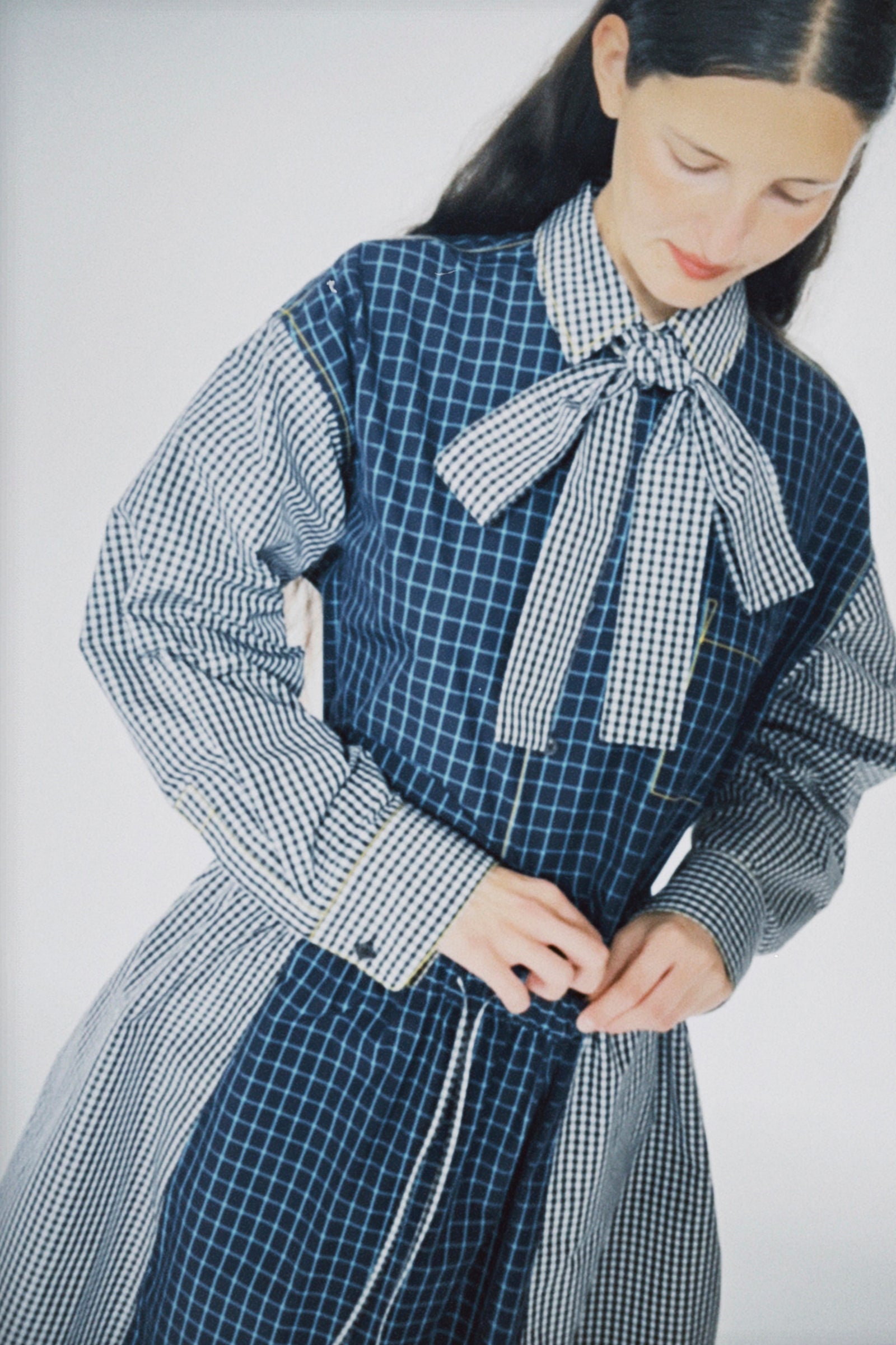 Woman wearing KasMaria Cotton Shirt with Tie on a white background