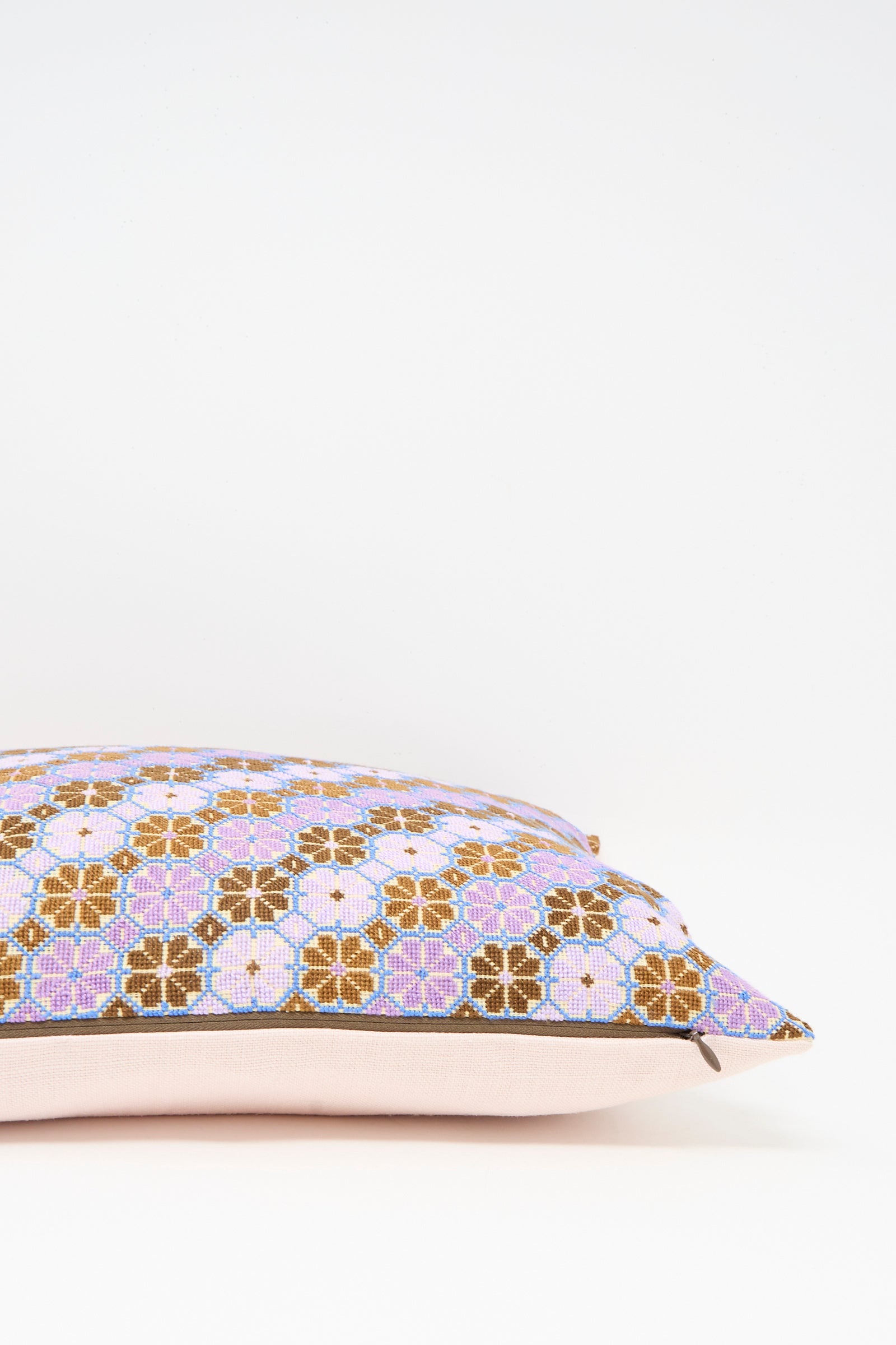 The Kissweh Damask Rose Hand Embroidered Pillow in Lilac and Cognac features a rectangular design with a pink, brown, and purple floral cover and a plush down feather insert, shown on a plain white background.