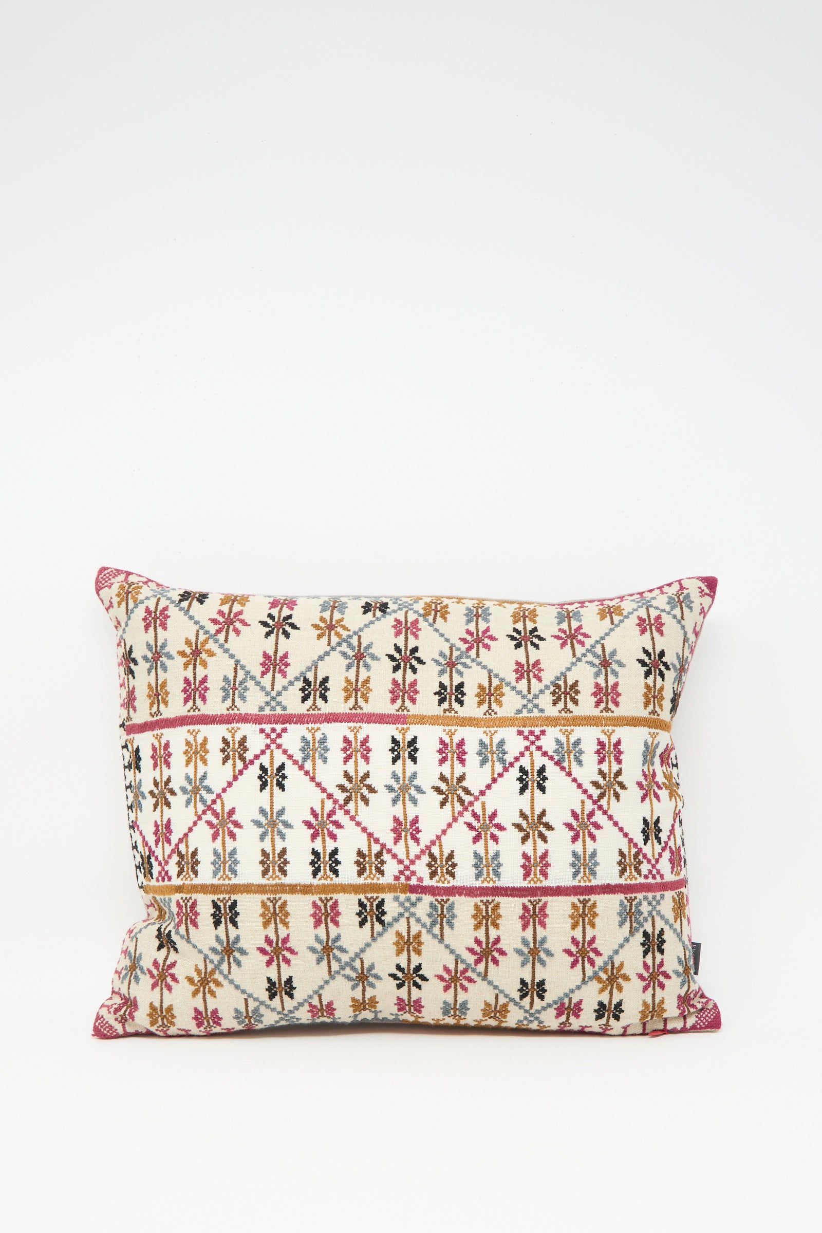 The Imm Omar Hand Embroidered Pillow in Beige and Chocolate by Kissweh features multicolored geometric and floral patterns on a cream background and includes a plush down feather insert for extra comfort.