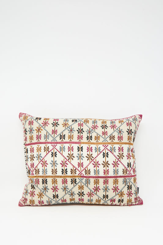 The Imm Omar Hand Embroidered Pillow in Beige and Chocolate by Kissweh features multicolored geometric and floral patterns on a cream background and includes a plush down feather insert for extra comfort.