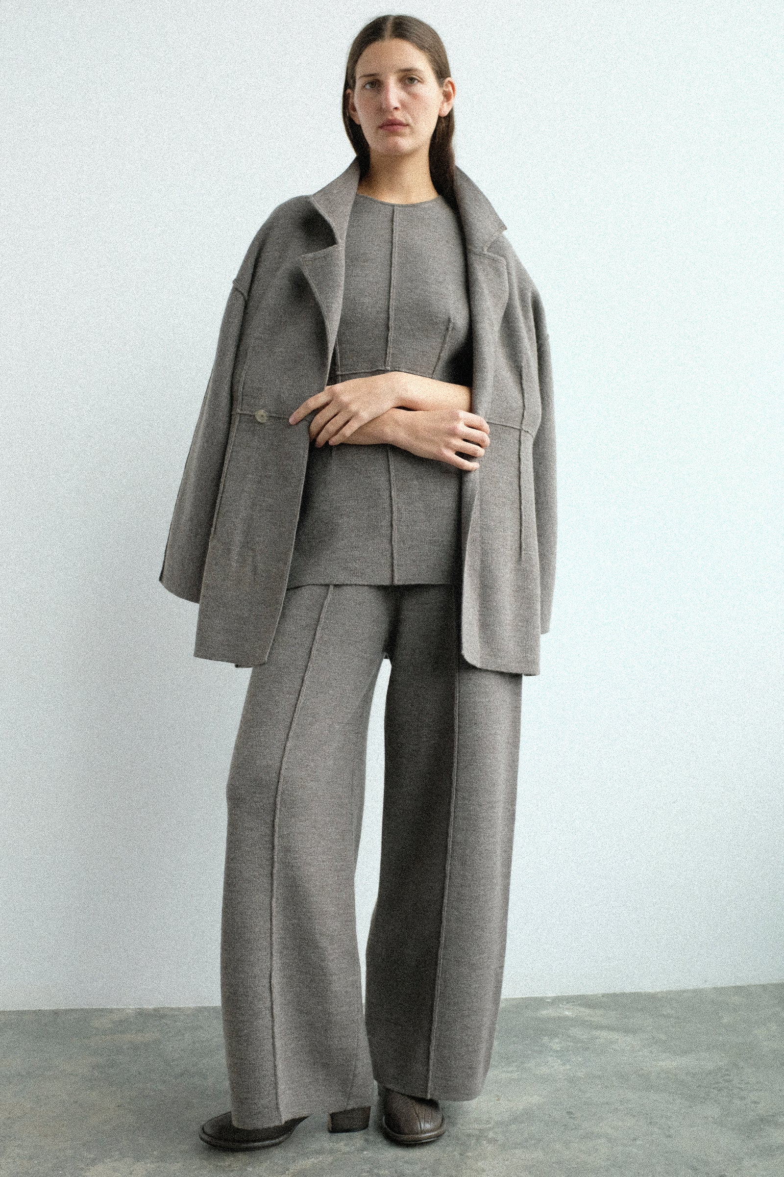 A woman wearing pieces from Lauren Manoogian's FW25 collection.