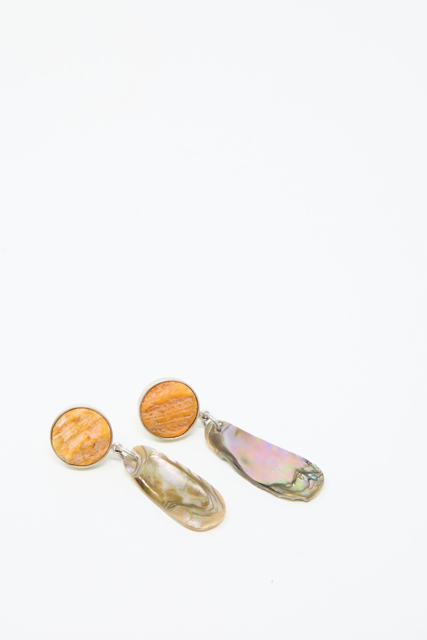 The Sterling Silver No. 09 Earrings in Orange and Shell by La Ma r feature circular shell tops and dangling iridescent abalone pendants, set on sterling silver against a light background.