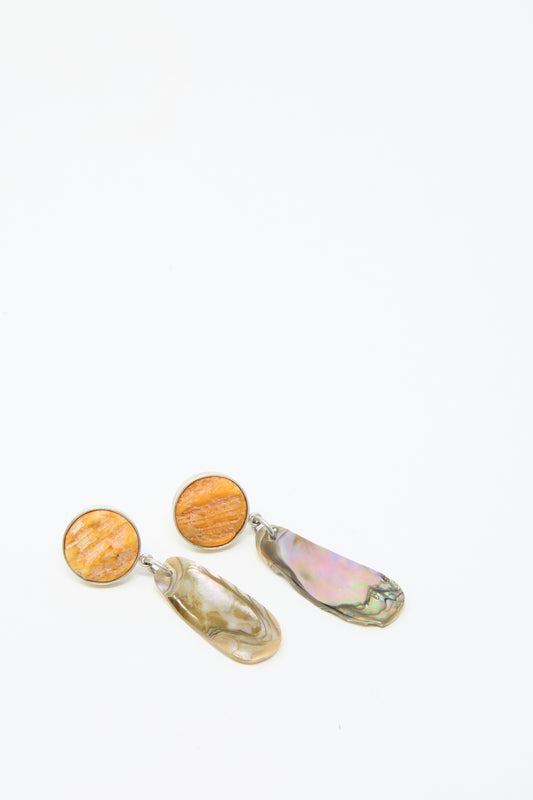 The Sterling Silver No. 09 Earrings in Orange and Shell by La Ma r feature circular shell tops and dangling iridescent abalone pendants, set on sterling silver against a light background.