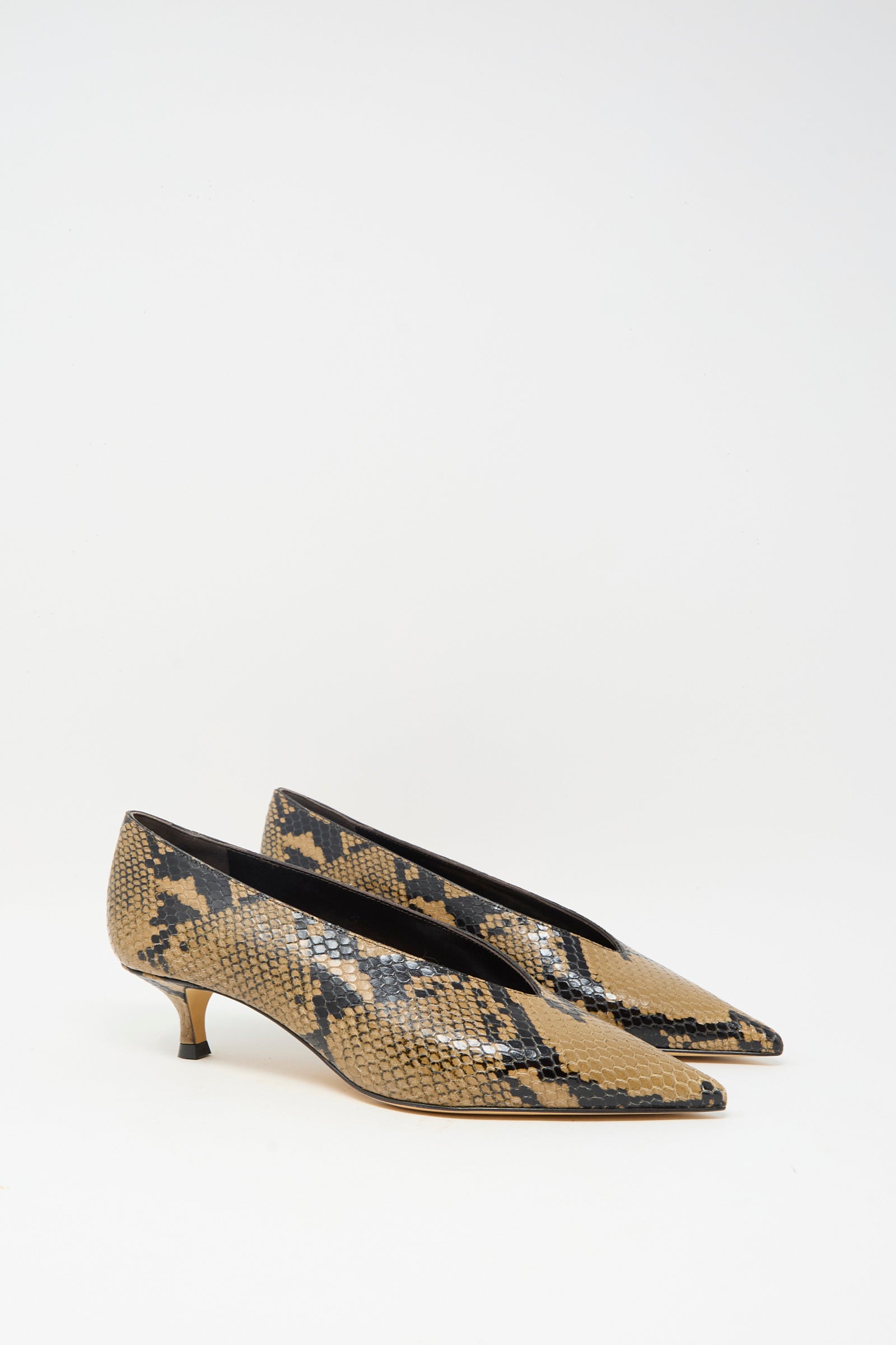 The Le Monde Beryl Babouche Kitten Heel in Fango features pointed toes and beige-black snake embossed leather, shown on a plain white background.