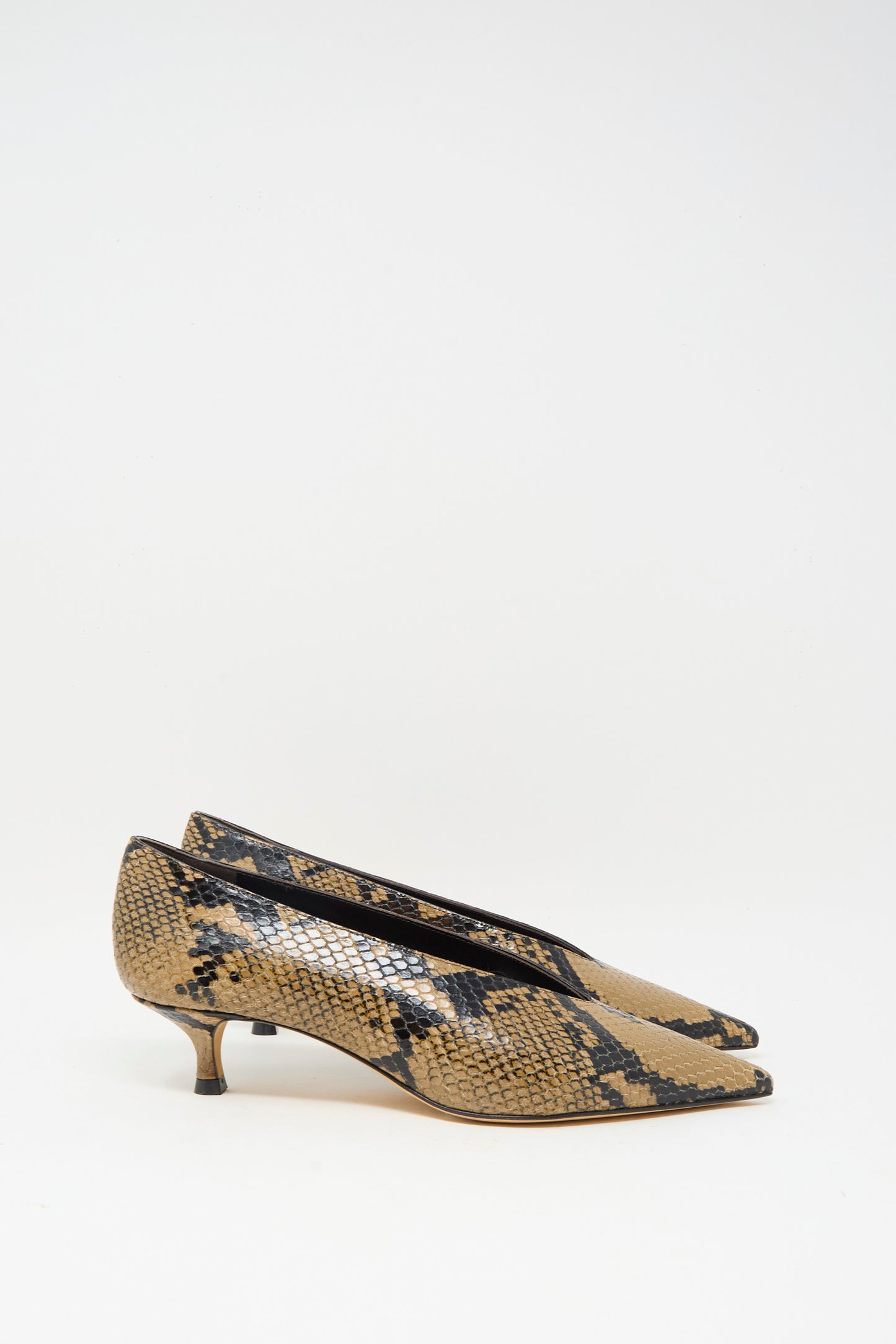 The Le Monde Beryl Babouche Kitten Heel in Fango features a pointed toe and kitten heel in beige and black snake-embossed leather, shown against a plain white background.