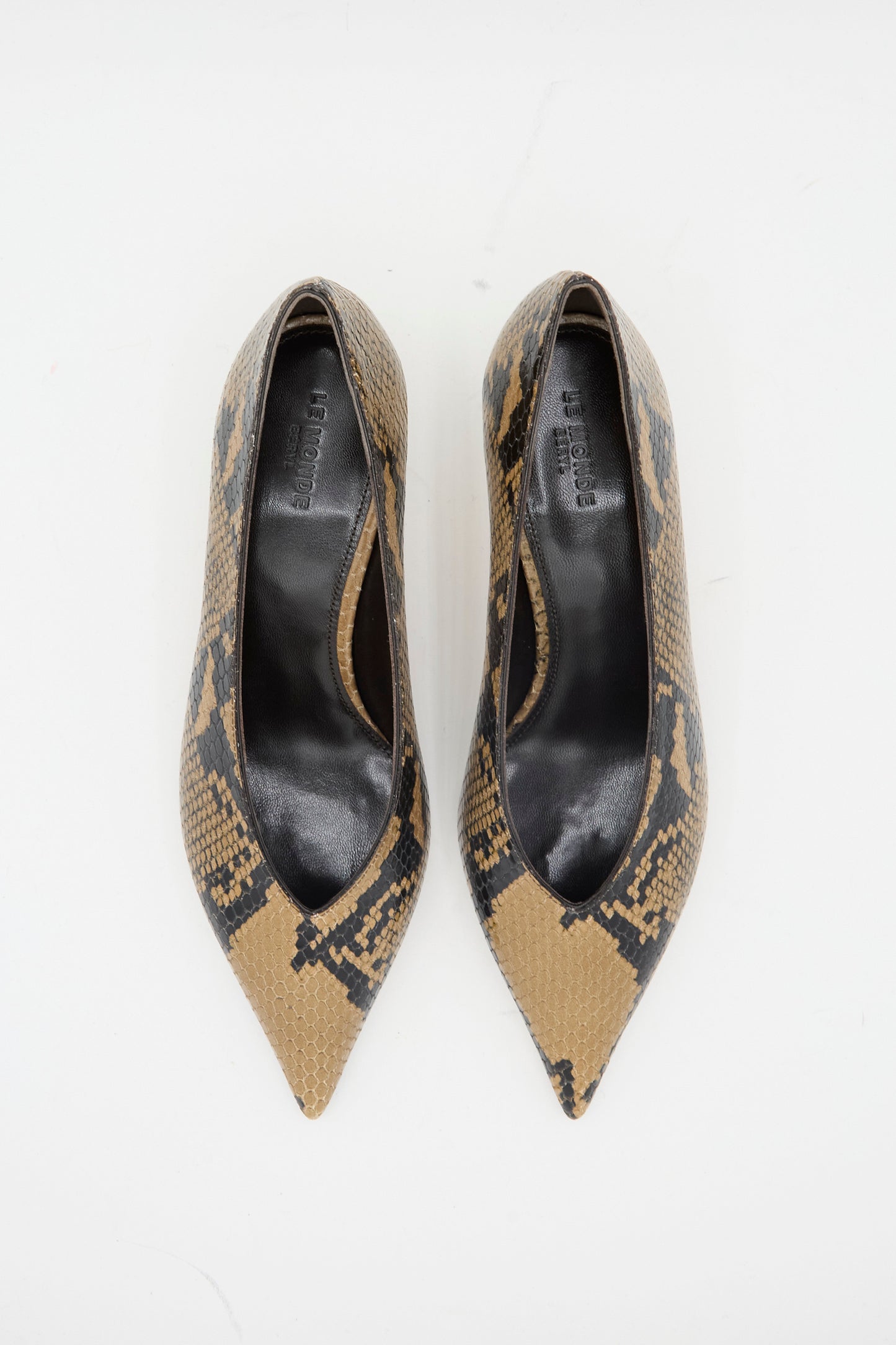 The Babouche Kitten Heel in Fango by Le Monde Beryl is a pair of pointed-toe, brown and black snake-embossed leather heels with kitten heels, shown on a white background.