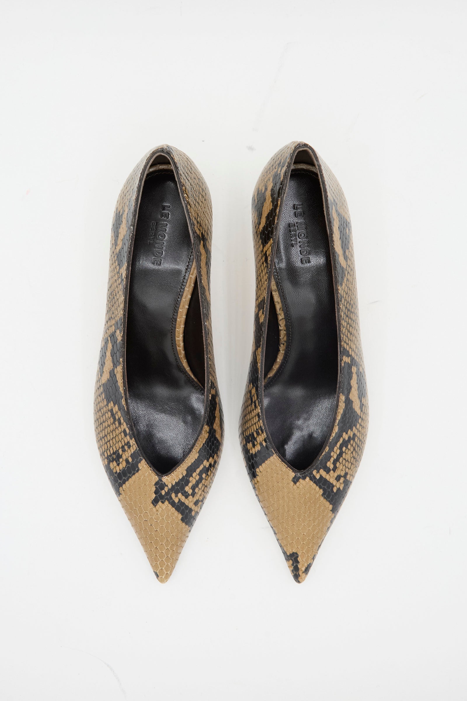 The Babouche Kitten Heel in Fango by Le Monde Beryl is a pair of pointed-toe, brown and black snake-embossed leather heels with kitten heels, shown on a white background.